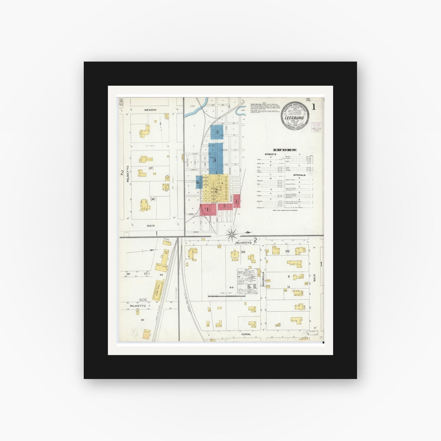 Old map wall art mockup — black gallery frame with white mat — Sanborn Fire Insurance Map from Leesburg, Lake County, Florida (1906), Sheet #0001
