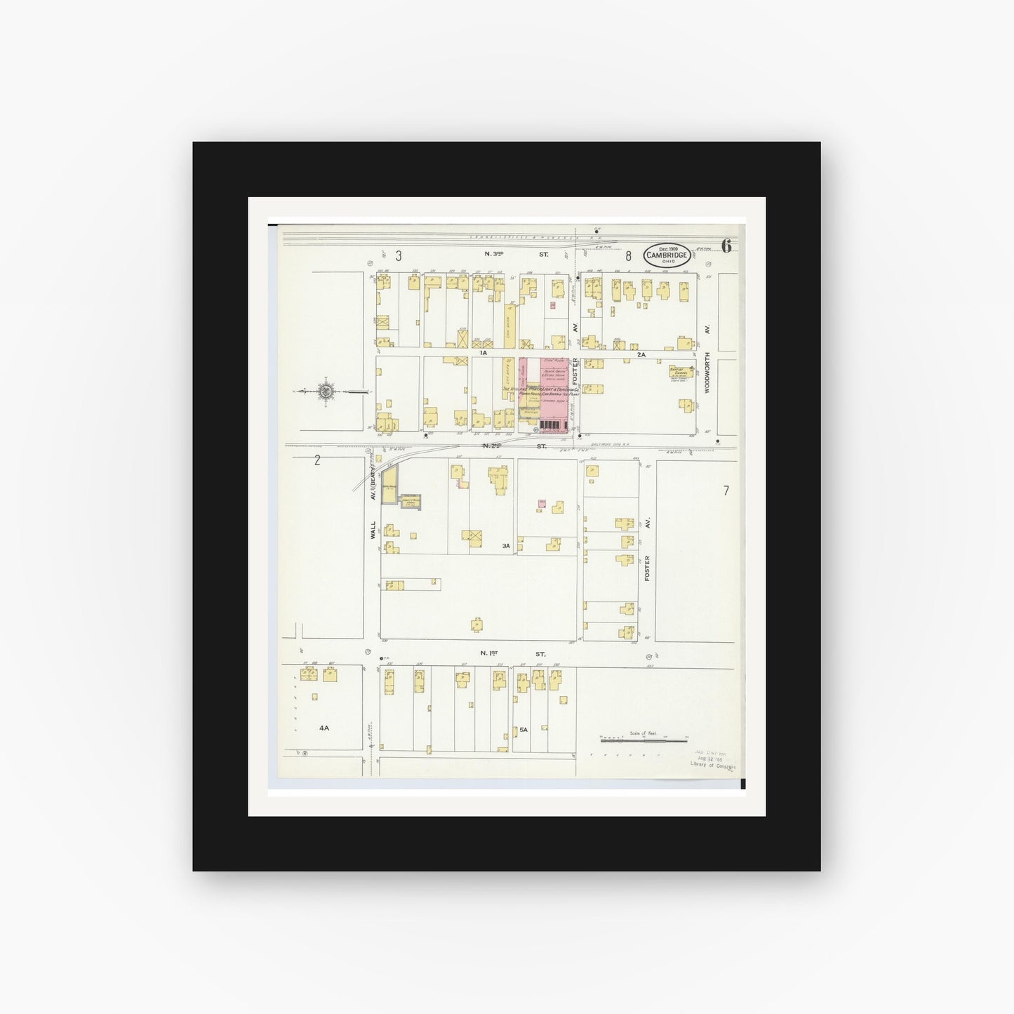 Old map wall art mockup — black gallery frame with white mat — Sanborn Fire Insurance Map from Cambridge, Guernsey County, Ohio (1909), Sheet #0006
