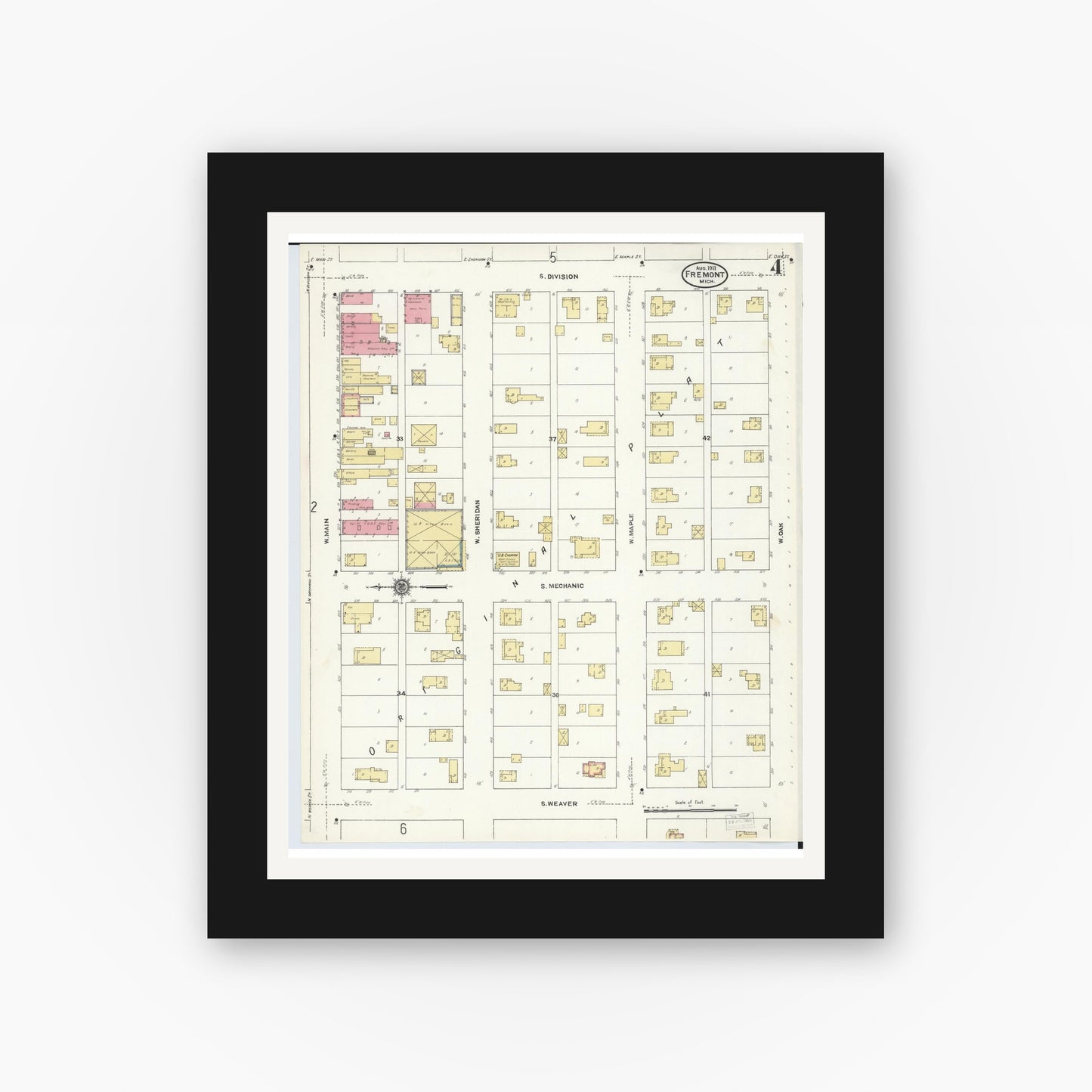 Old map wall art mockup — black gallery frame with white mat — Sanborn Fire Insurance Map from Fremont, Newaygo County, Michigan (1911), Sheet #0004