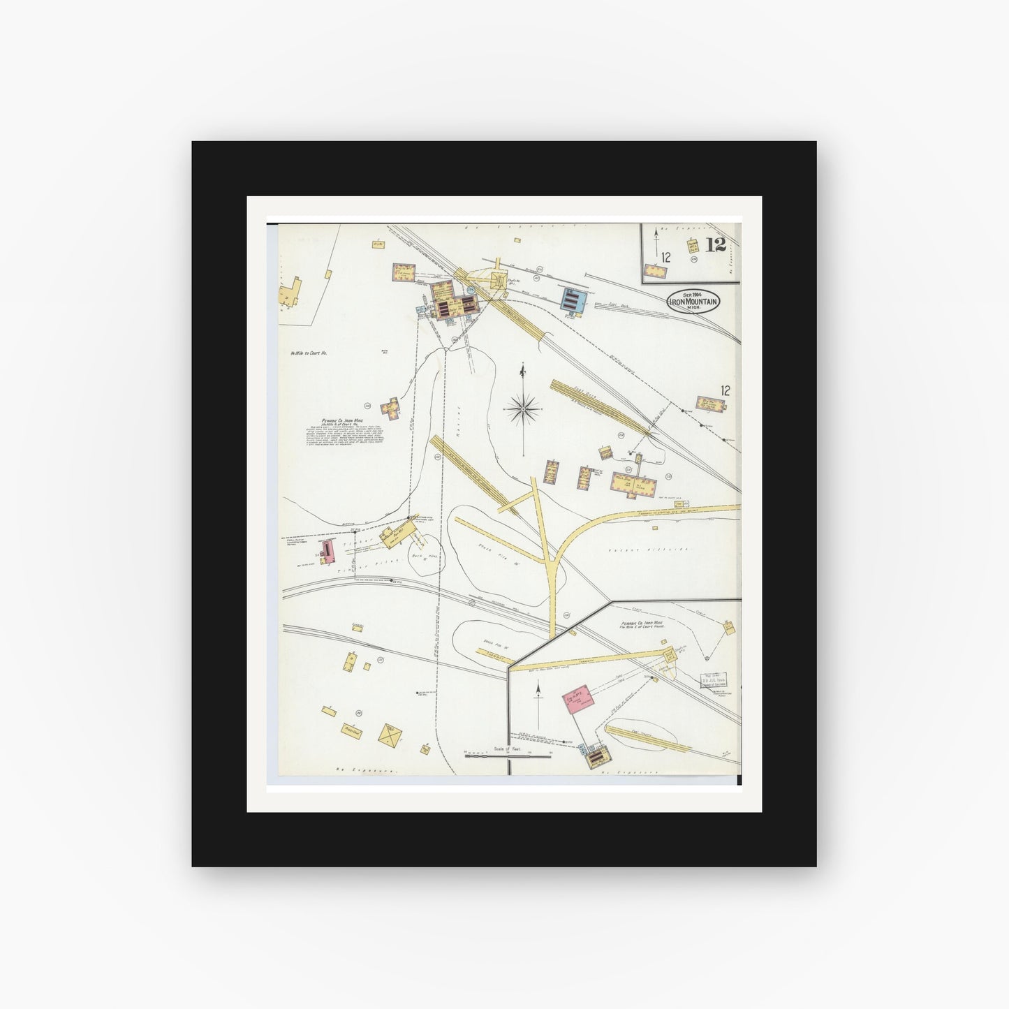 Old map wall art mockup — black gallery frame with white mat — Sanborn Fire Insurance Map from Iron Mountain, Dickinson County, Michigan (1904), Sheet #0012