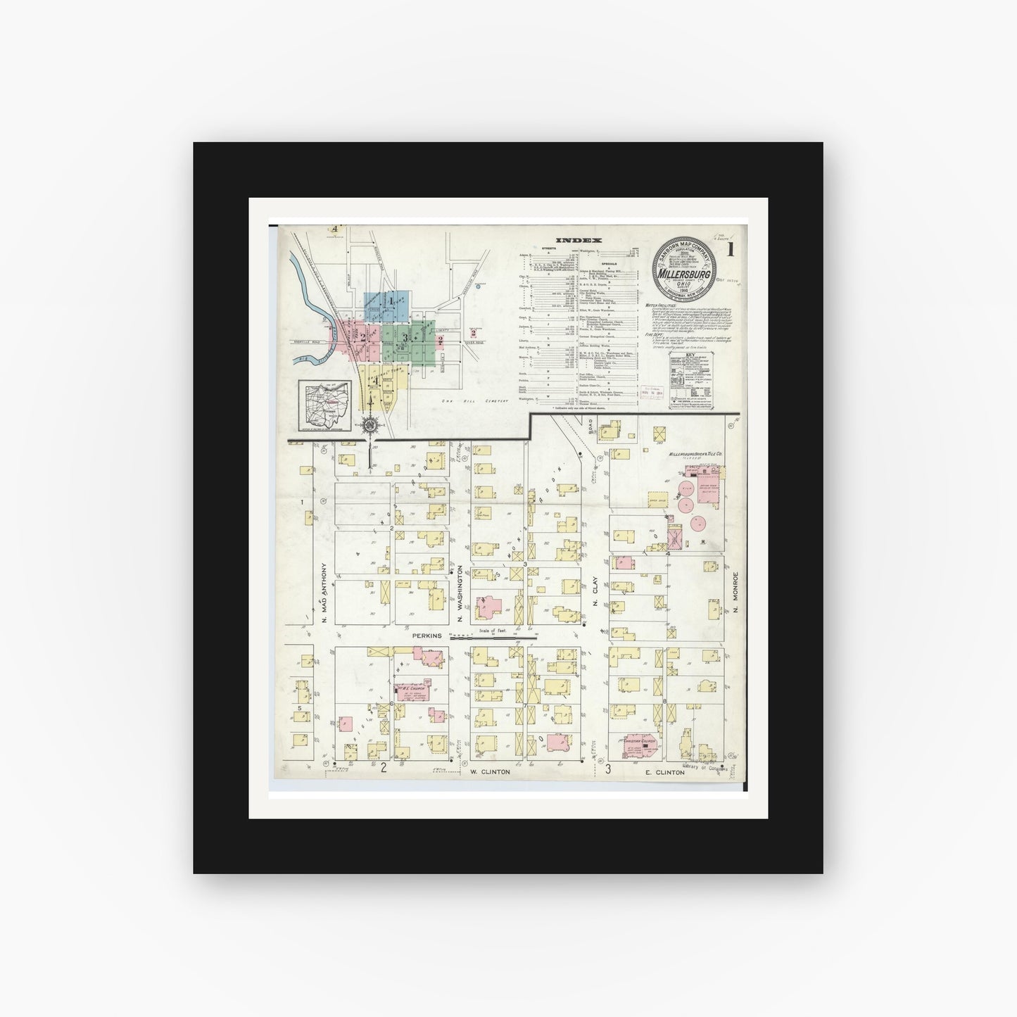 Old map wall art mockup — black gallery frame with white mat — Sanborn Fire Insurance Map from Millersburg, Holmes County, Ohio (1914), Sheet #0001