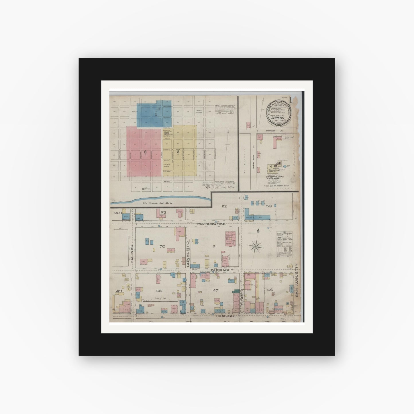 Old map wall art mockup — black gallery frame with white mat — Sanborn Fire Insurance Map from Laredo, Webb County, Texas (1885), Sheet #0001