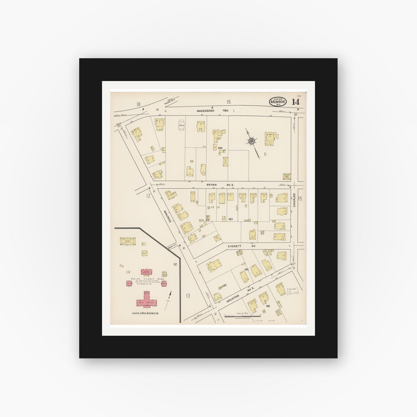 Old map wall art mockup — black gallery frame with white mat — Sanborn Fire Insurance Map from Monroe, Union County, North Carolina (1922), Sheet #0014