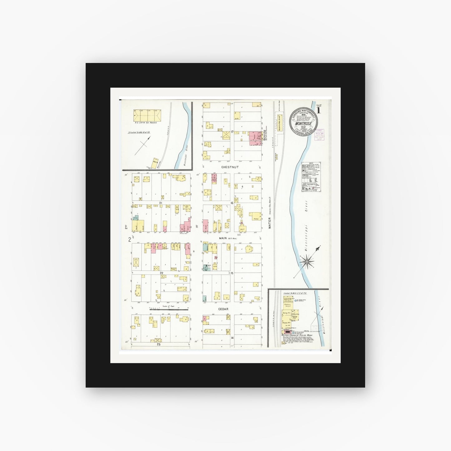 Old map wall art mockup — black gallery frame with white mat — Sanborn Fire Insurance Map from Montrose, Lee County, Iowa (1902) — Complete Set