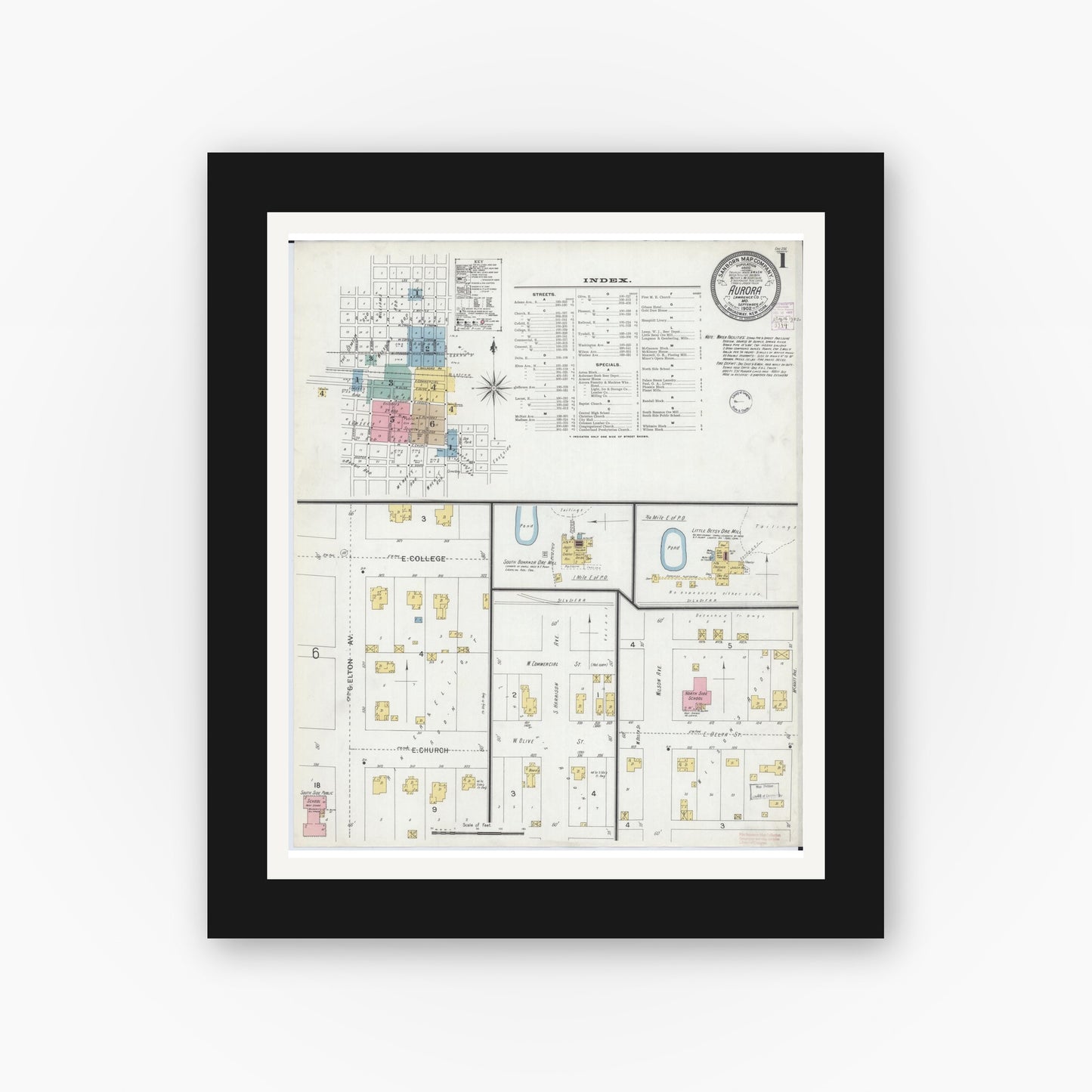 Old map wall art mockup — black gallery frame with white mat — Sanborn Fire Insurance Map from Aurora, Lawrence County, Missouri (1902) - Complete Map Set