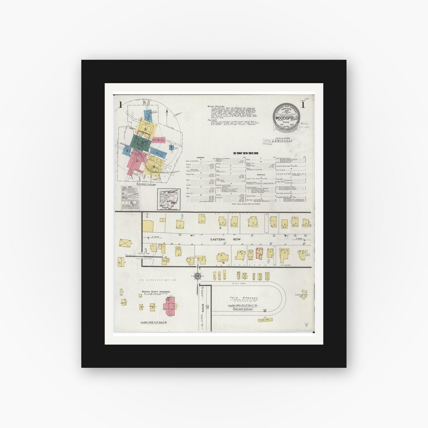 Old map wall art mockup — black gallery frame with white mat — Sanborn Fire Insurance Map from Woodsfield, Monroe County, Ohio (1923), Sheet #0001
