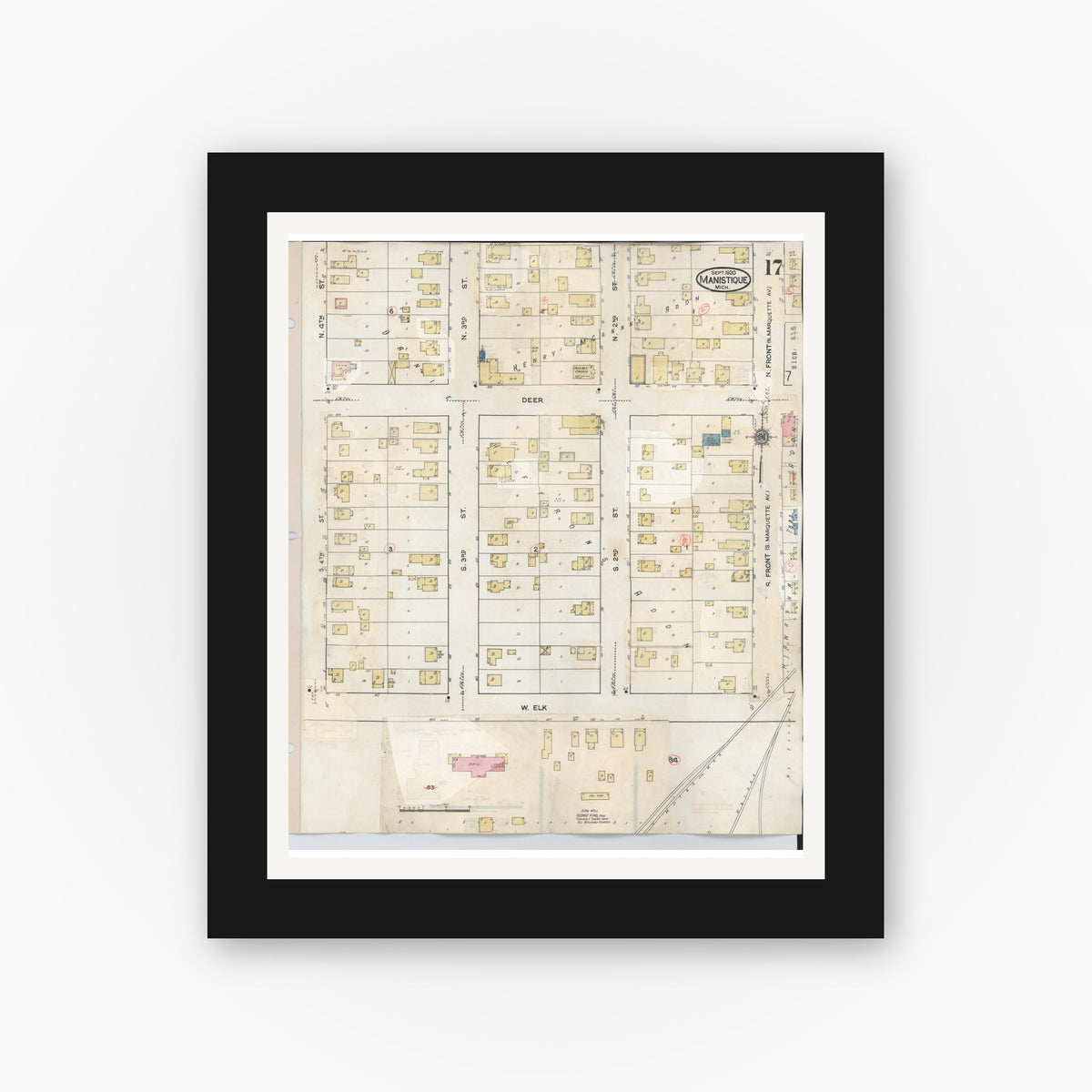 Old map wall art mockup — black gallery frame with white mat — Sanborn Fire Insurance Map from Manistique, Schoolcraft County, Michigan (1950), Sheet #0017