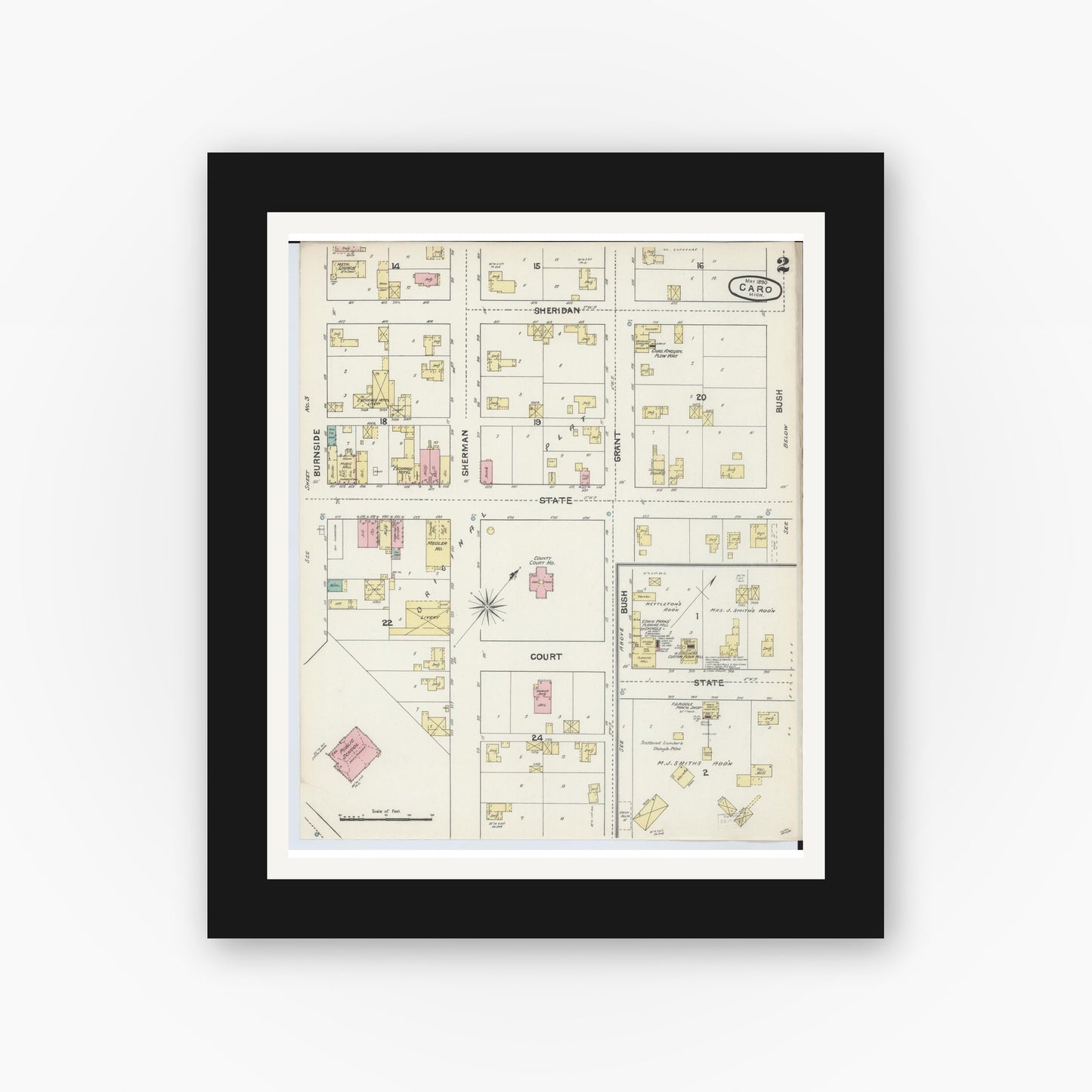 Old map wall art mockup — black gallery frame with white mat — Sanborn Fire Insurance Map from Caro, Tuscola County, Michigan (1890), Sheet #0002