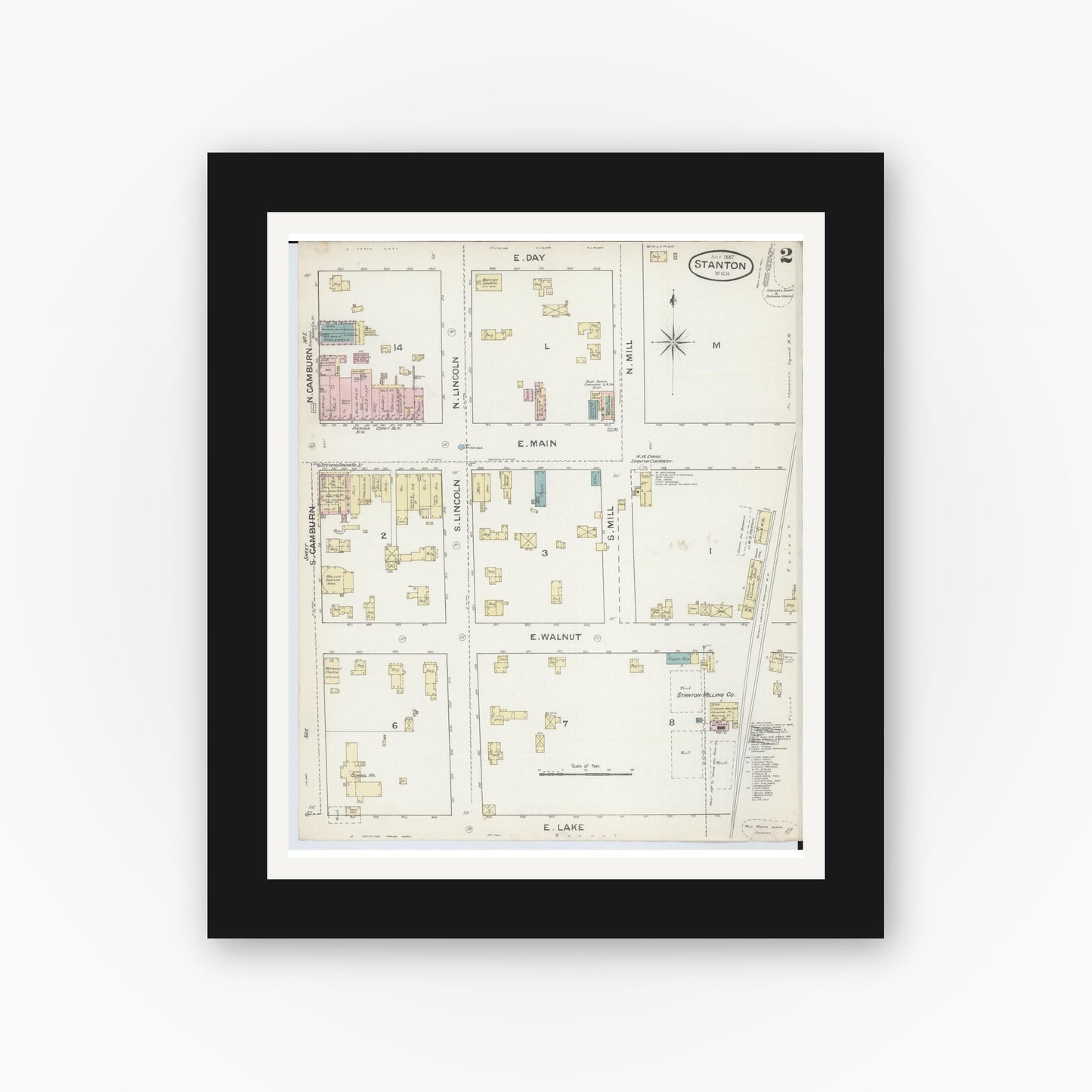 Old map wall art mockup — black gallery frame with white mat — Sanborn Fire Insurance Map from Stanton, Montcalm County, Michigan (1887), Sheet #0002