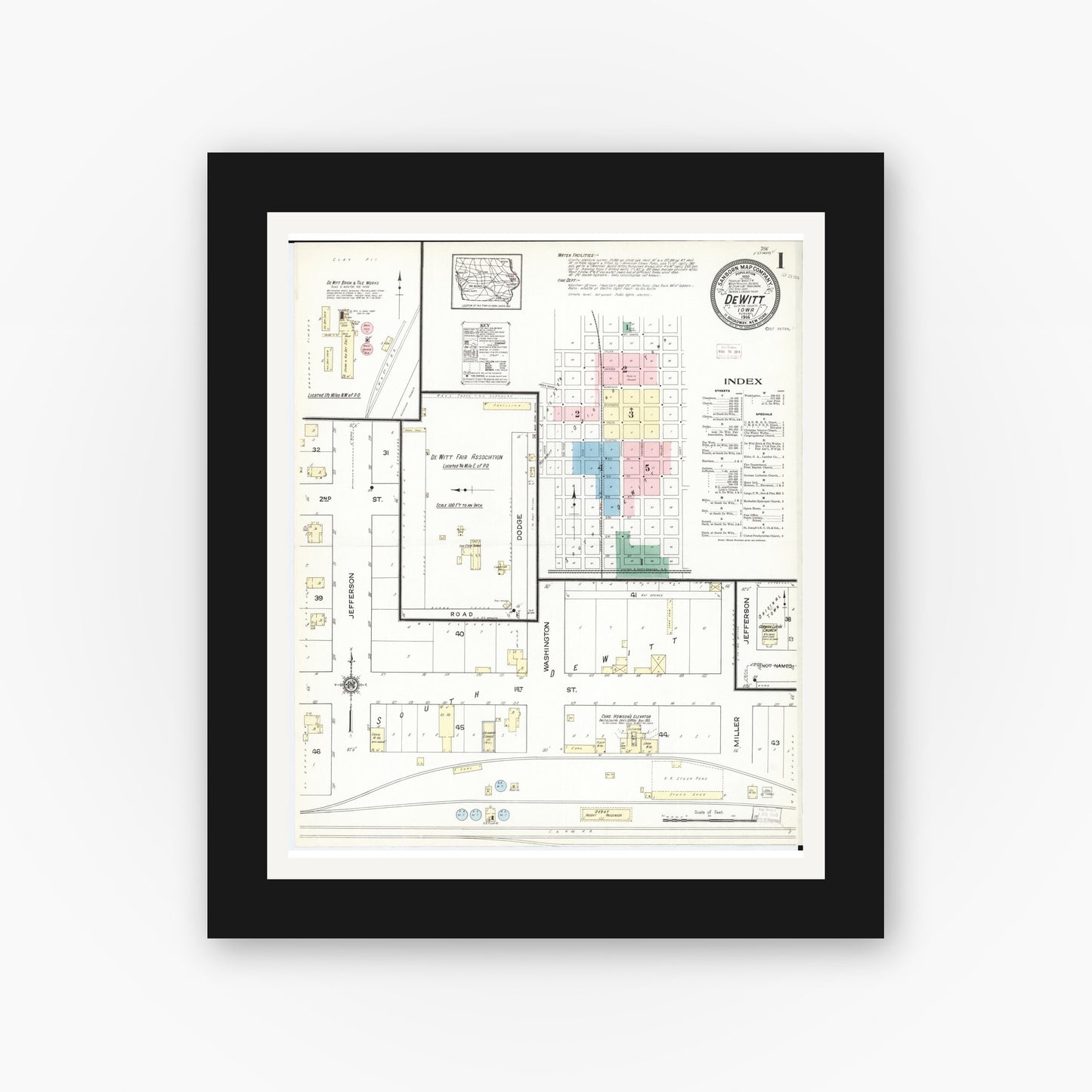 Old map wall art mockup — black gallery frame with white mat — Sanborn Fire Insurance Map from De Witt, Clinton County, Iowa (1914) — Complete Set