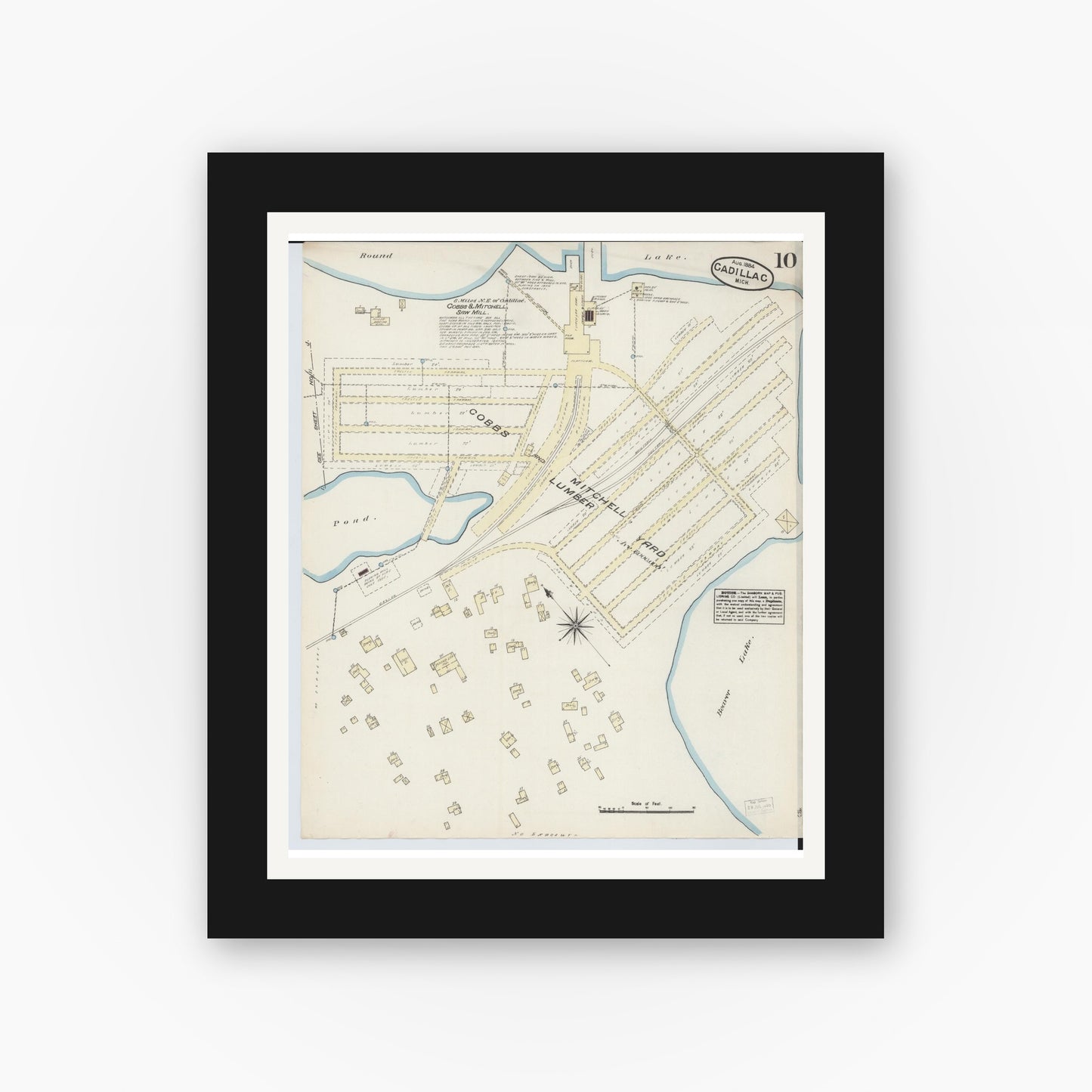 Old map wall art mockup — black gallery frame with white mat — Sanborn Fire Insurance Map from Cadillac, Wexford County, Michigan (1884), Sheet #0010