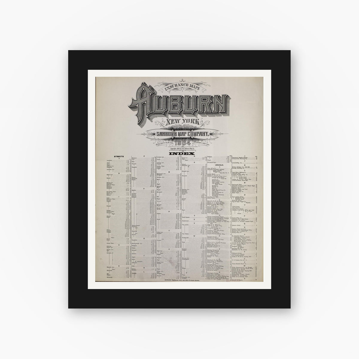 Old map wall art mockup — black gallery frame with white mat — Sanborn Fire Insurance Map from Auburn, Cayuga County, New York (1904), Sheet #0001