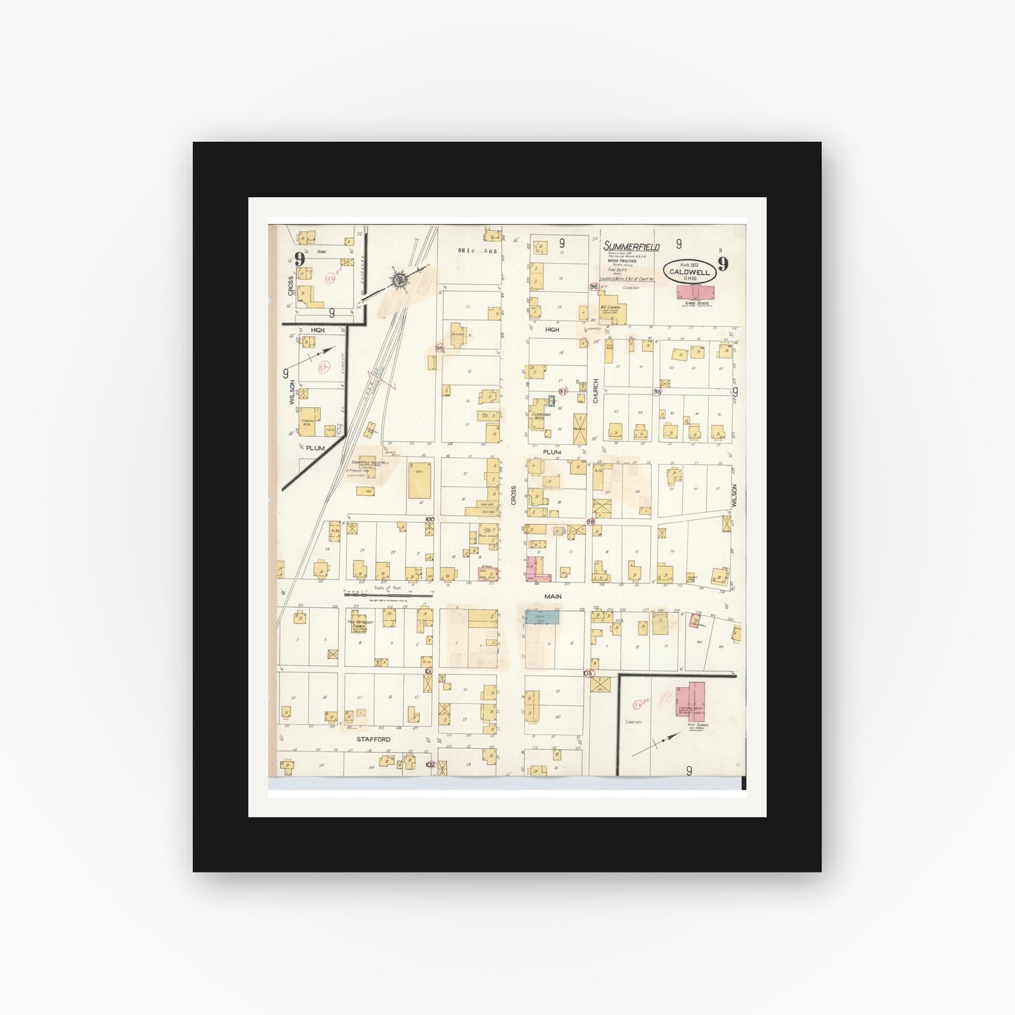 Old map wall art mockup — black gallery frame with white mat — Sanborn Fire Insurance Map from Caldwell, Noble County, Ohio (1932), Sheet #0009