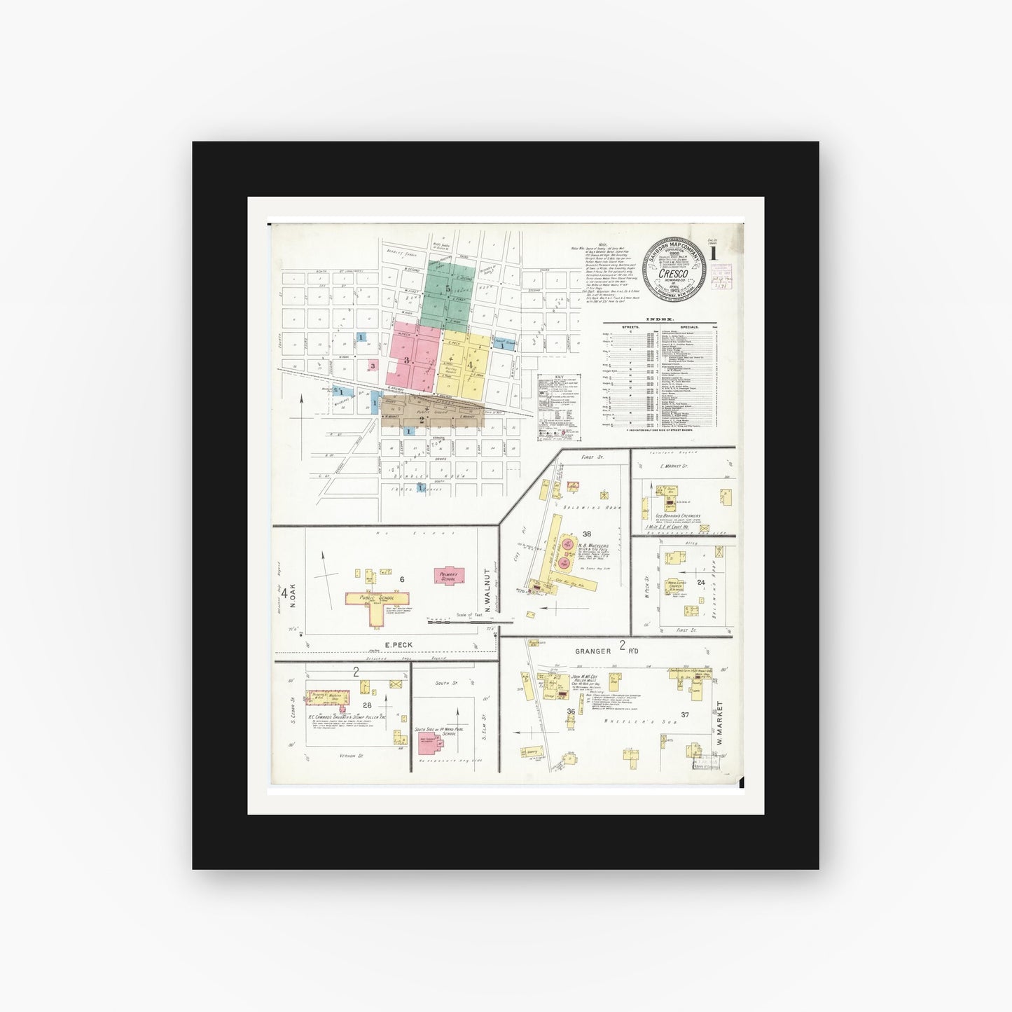 Old map wall art mockup — black gallery frame with white mat — Sanborn Fire Insurance Map from Cresco, Howard County, Iowa (1902) — Complete Set