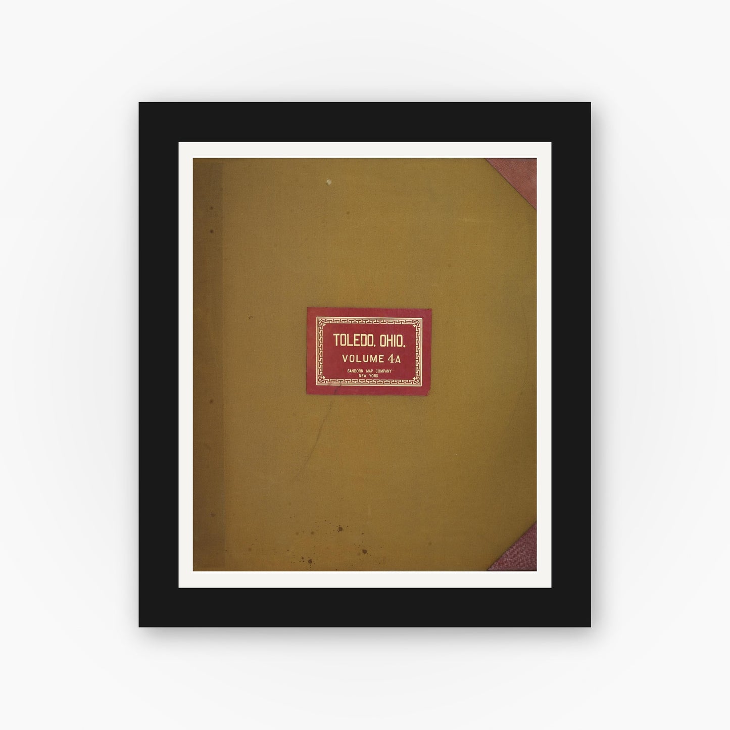 Old map wall art mockup — black gallery frame with white mat — Sanborn Fire Insurance Map from Toledo, Lucas County, Ohio (1949), Sheet #0001