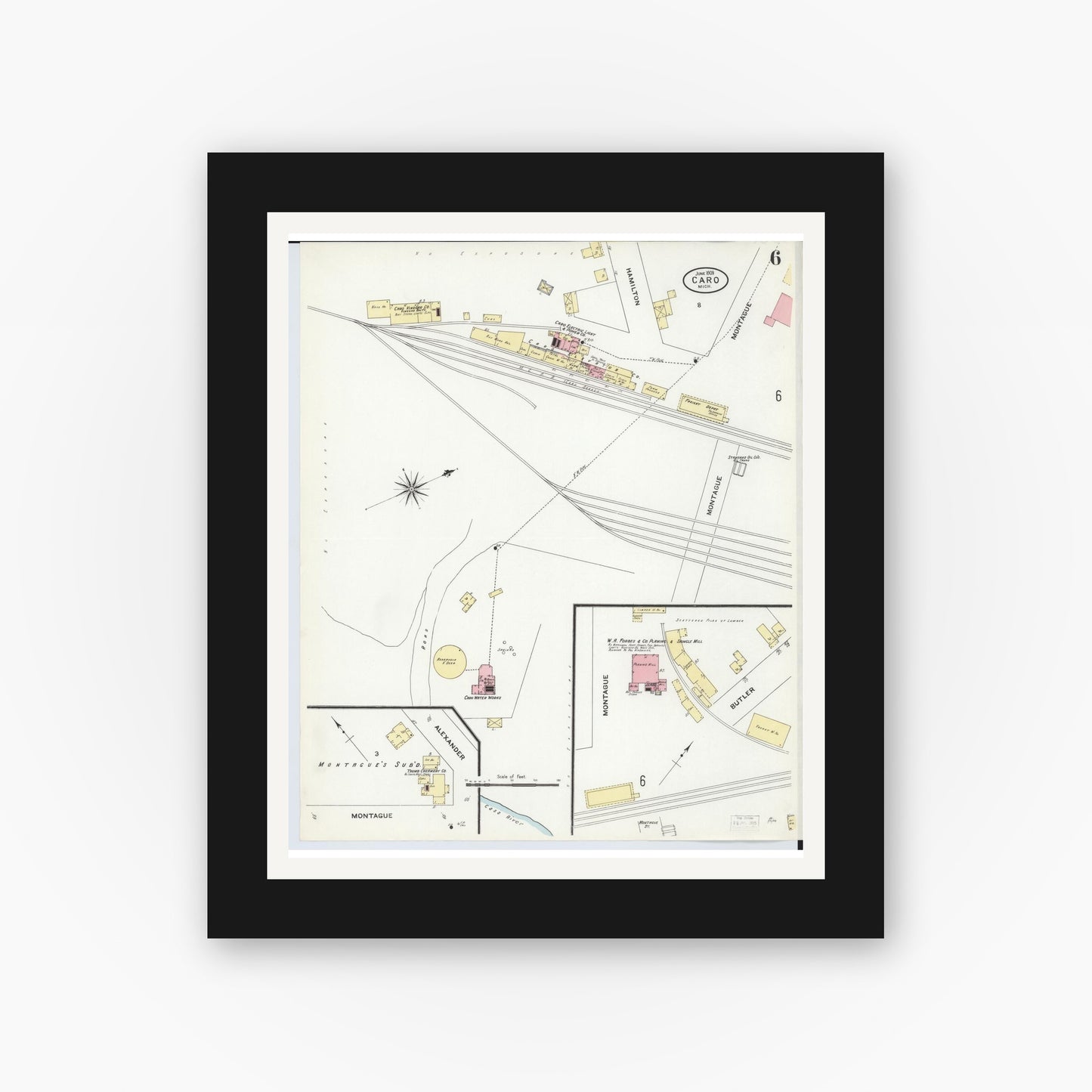 Old map wall art mockup — black gallery frame with white mat — Sanborn Fire Insurance Map from Caro, Tuscola County, Michigan (1909), Sheet #0006
