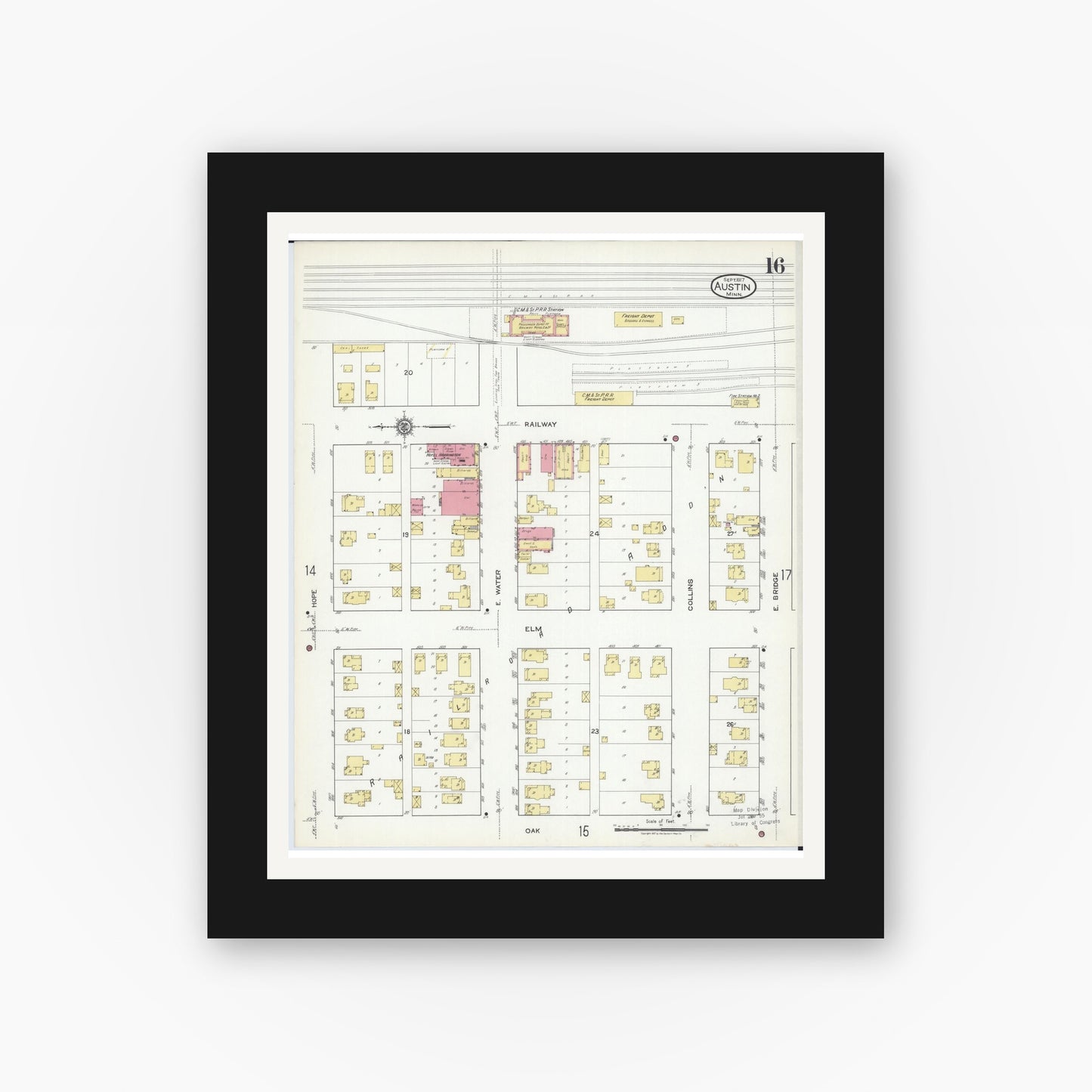 Old map wall art mockup — black gallery frame with white mat — Sanborn Fire Insurance Map from Austin, Mower County, Minnesota (1917), Sheet #0016
