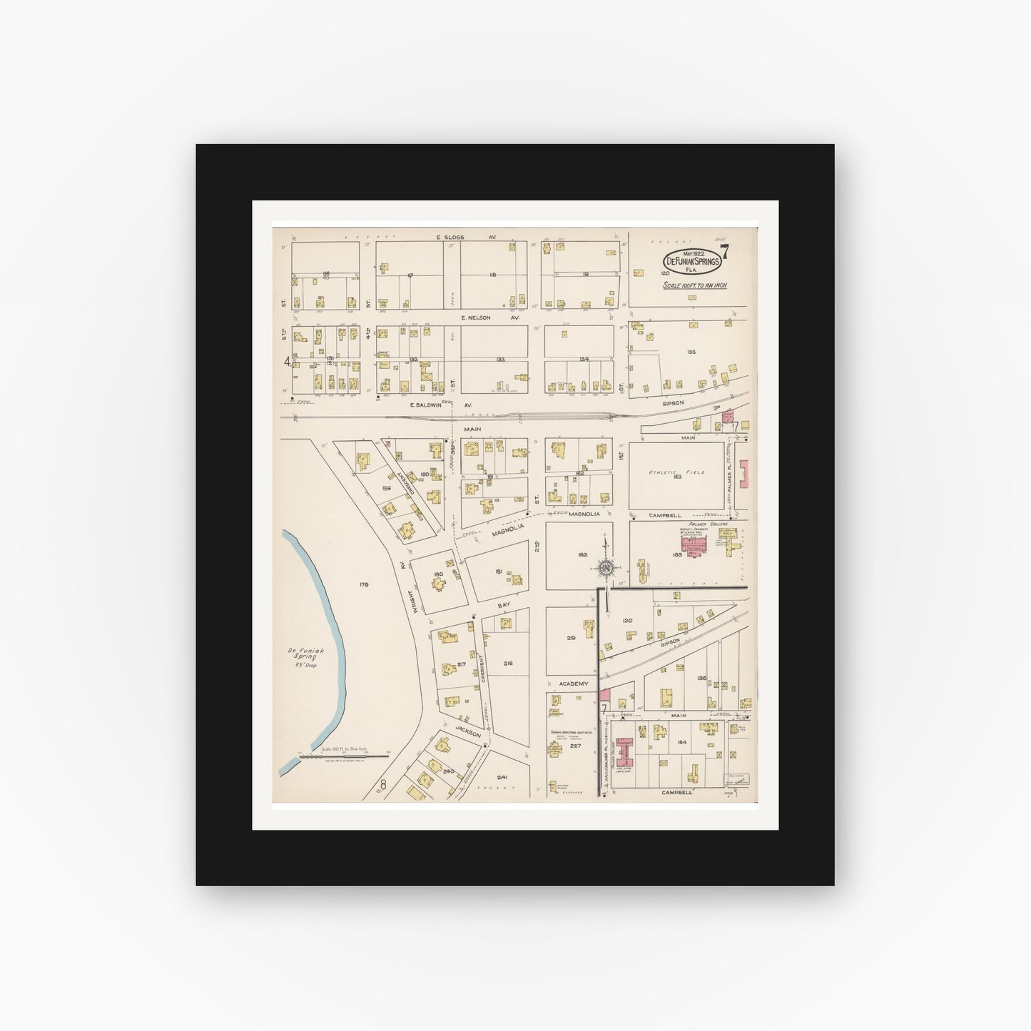 Old map wall art mockup — black gallery frame with white mat — Sanborn Fire Insurance Map from De Funiak Springs, Walton County, Florida (1922), Sheet #0007