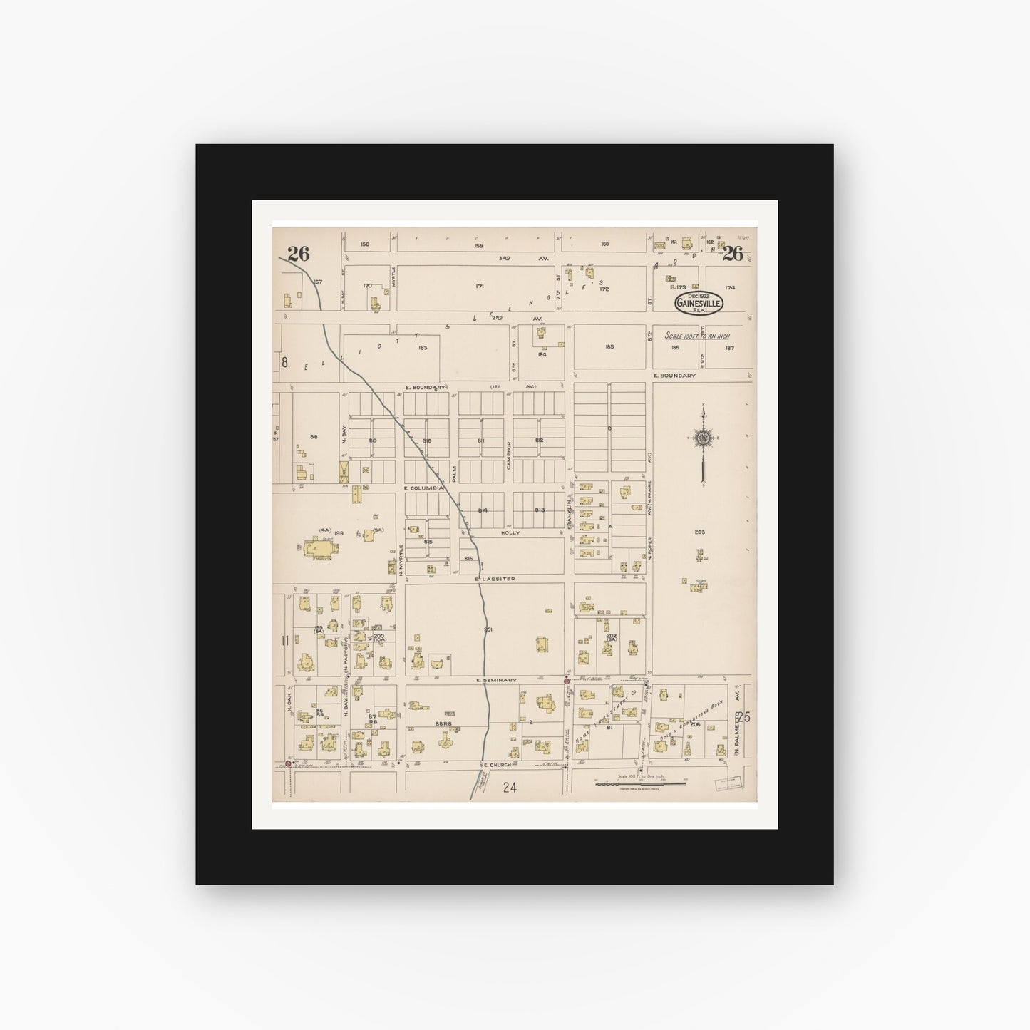 Old map wall art mockup — black gallery frame with white mat — Sanborn Fire Insurance Map from Gainesville, Alachua County, Florida (1922), Sheet #0026