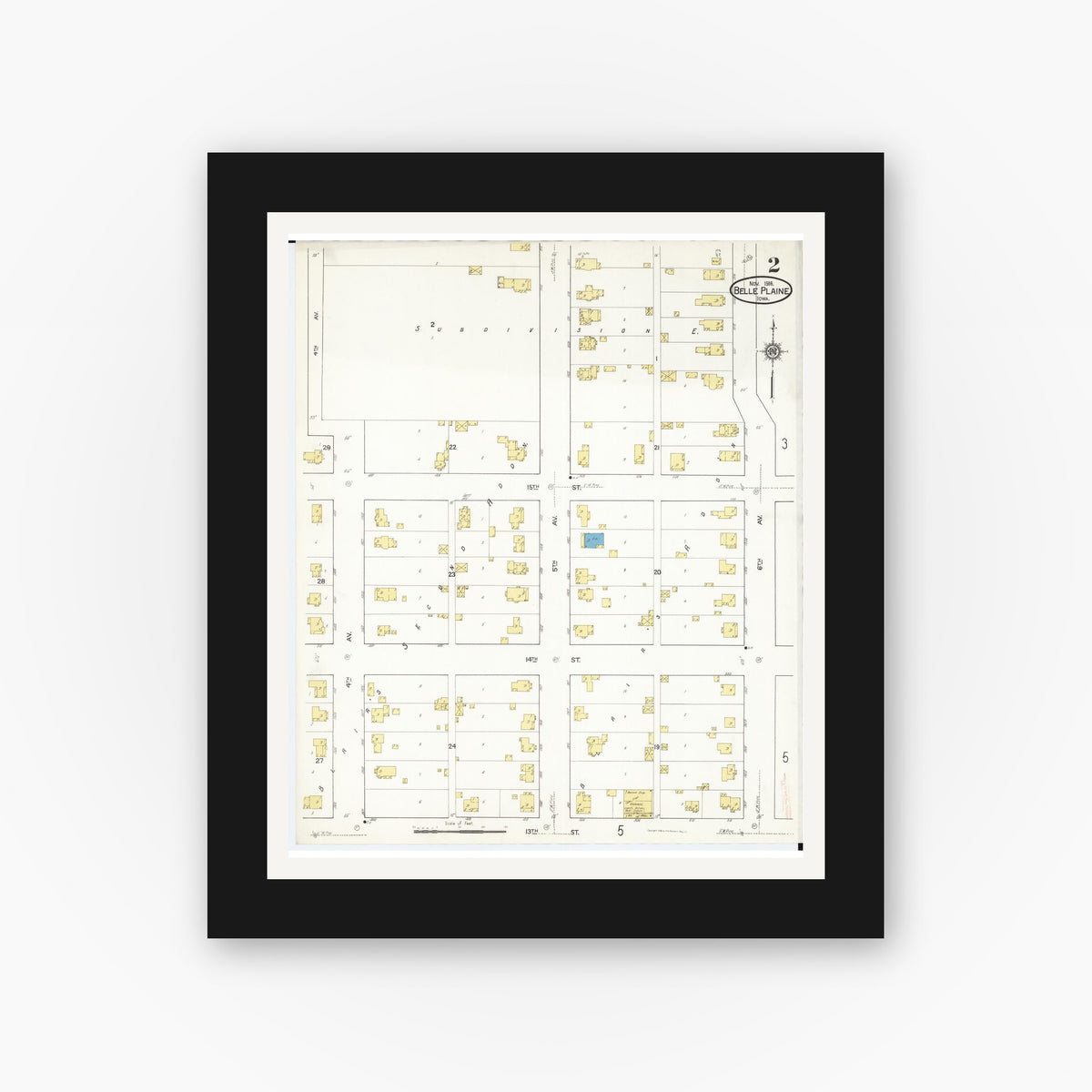 Old map wall art mockup — black gallery frame with white mat — Sanborn Fire Insurance Map from Belle Plaine, Benton County, Iowa (1916), Sheet #0002