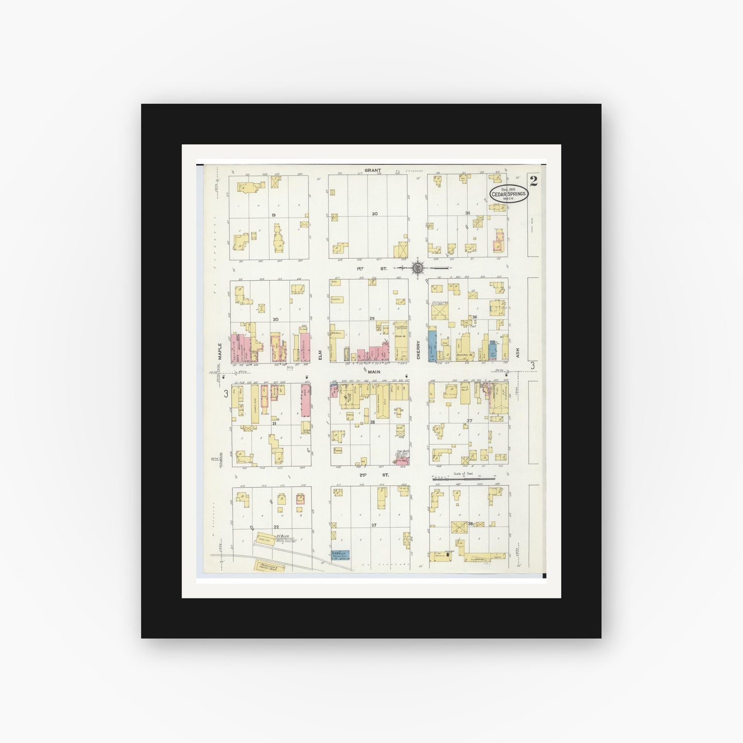 Old map wall art mockup — black gallery frame with white mat — Sanborn Fire Insurance Map from Cedar Springs, Kent County, Michigan (1910), Sheet #0002