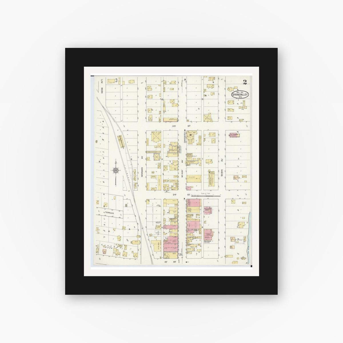 Old map wall art mockup — black gallery frame with white mat — Sanborn Fire Insurance Map from Spring Valley, Pierce County, Wisconsin (1912), Sheet #0002