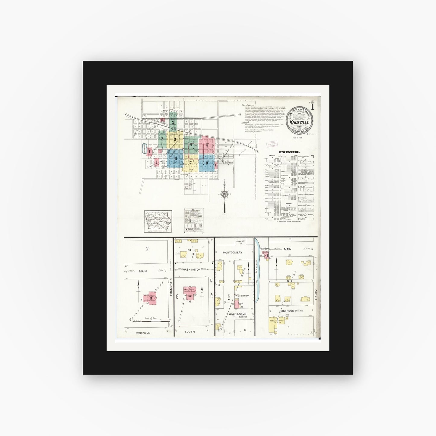 Old map wall art mockup — black gallery frame with white mat — Sanborn Fire Insurance Map from Knoxville, Marion County, Iowa (1913) — Complete Set