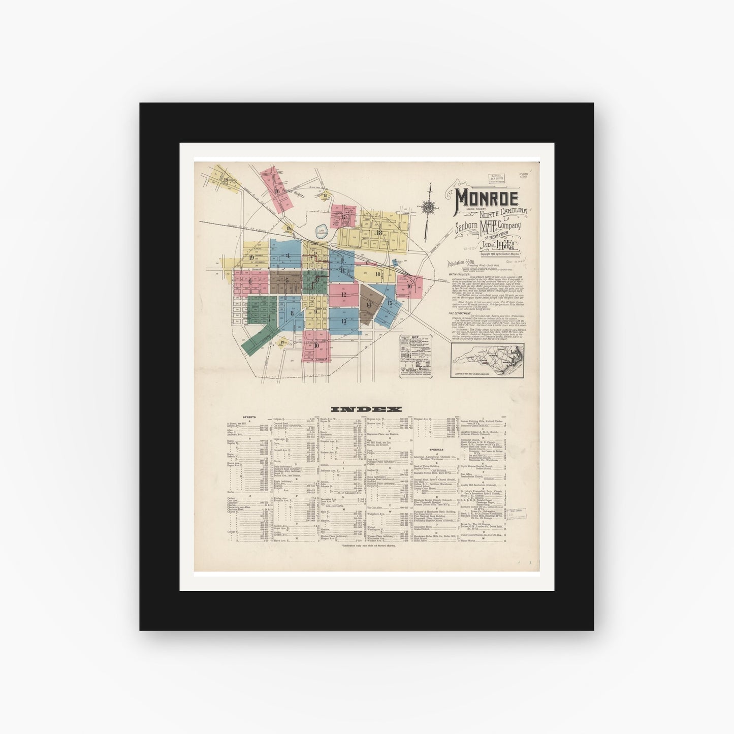 Old map wall art mockup — black gallery frame with white mat — Sanborn Fire Insurance Map from Monroe, Union County, North Carolina (1922), Sheet #0001