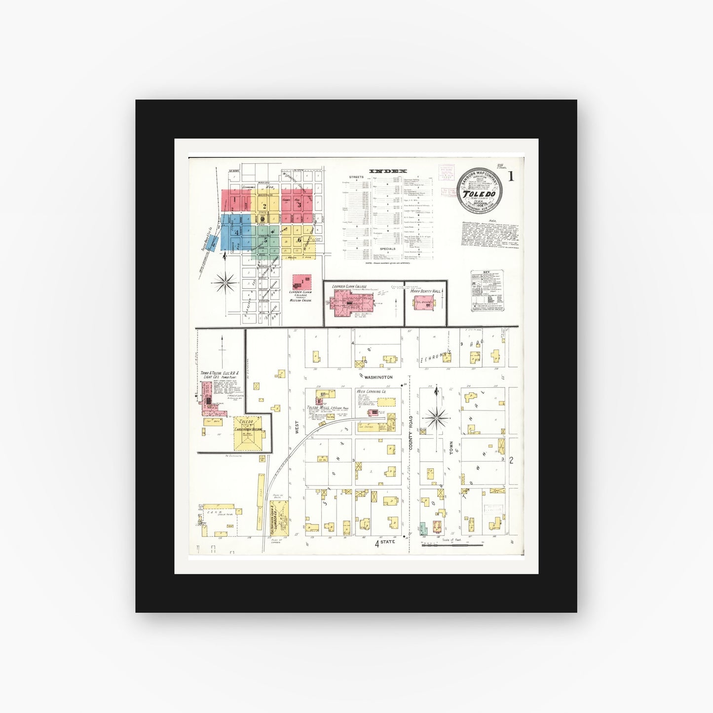 Old map wall art mockup — black gallery frame with white mat — Sanborn Fire Insurance Map from Toledo, Tama County, Iowa (1906) — Complete Set