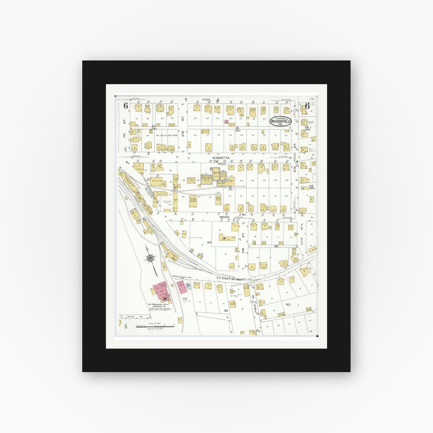 Old map wall art mockup — black gallery frame with white mat — Sanborn Fire Insurance Map from Woodsfield, Monroe County, Ohio (1923), Sheet #0006
