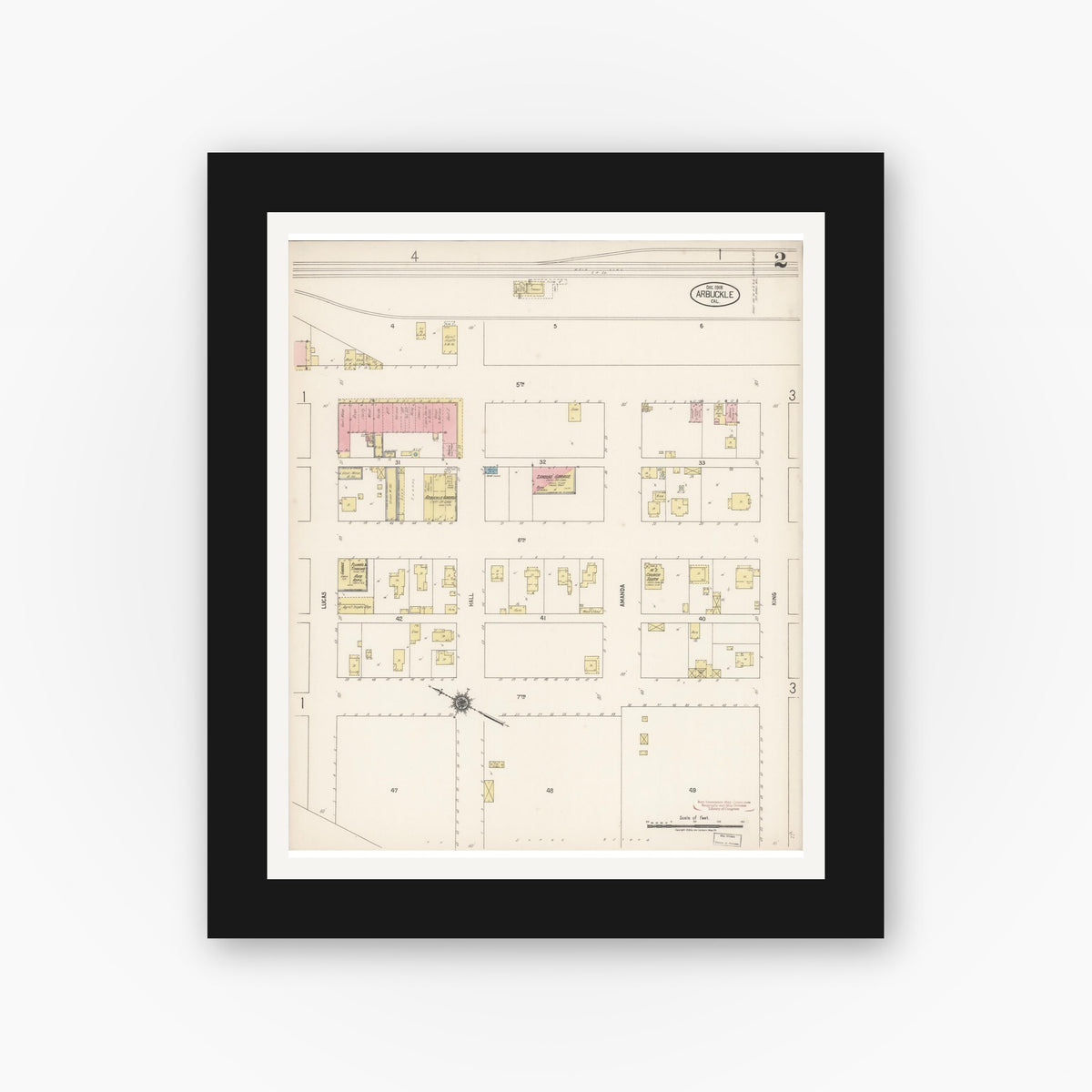 Old map wall art mockup — black gallery frame with white mat — Sanborn Fire Insurance Map from Arbuckle, Colusa County, California (1918), Sheet #0002