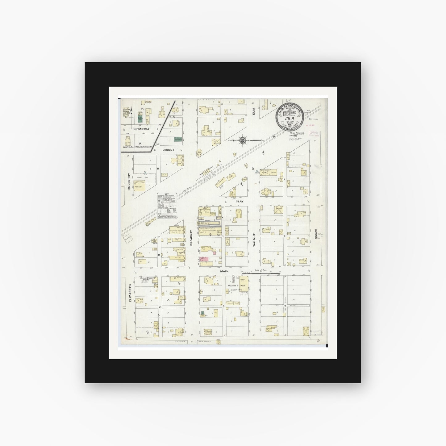 Old map wall art mockup — black gallery frame with white mat — Sanborn Fire Insurance Map from Iola, Clay County, Illinois (1910), Sheet #0001