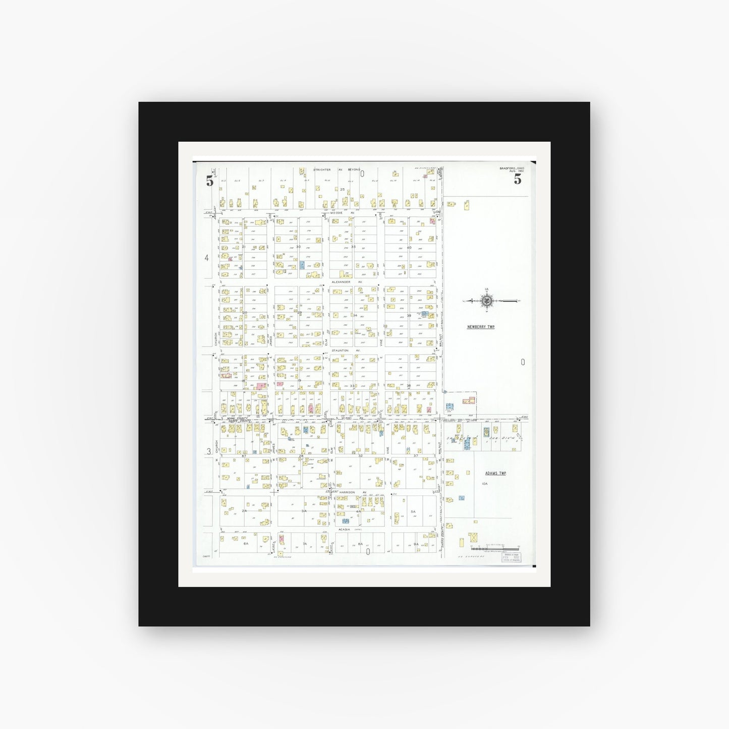 Old map wall art mockup — black gallery frame with white mat — Sanborn Fire Insurance Map from Bradford, Darke and Miami Counties, Ohio (1951), Sheet #0005