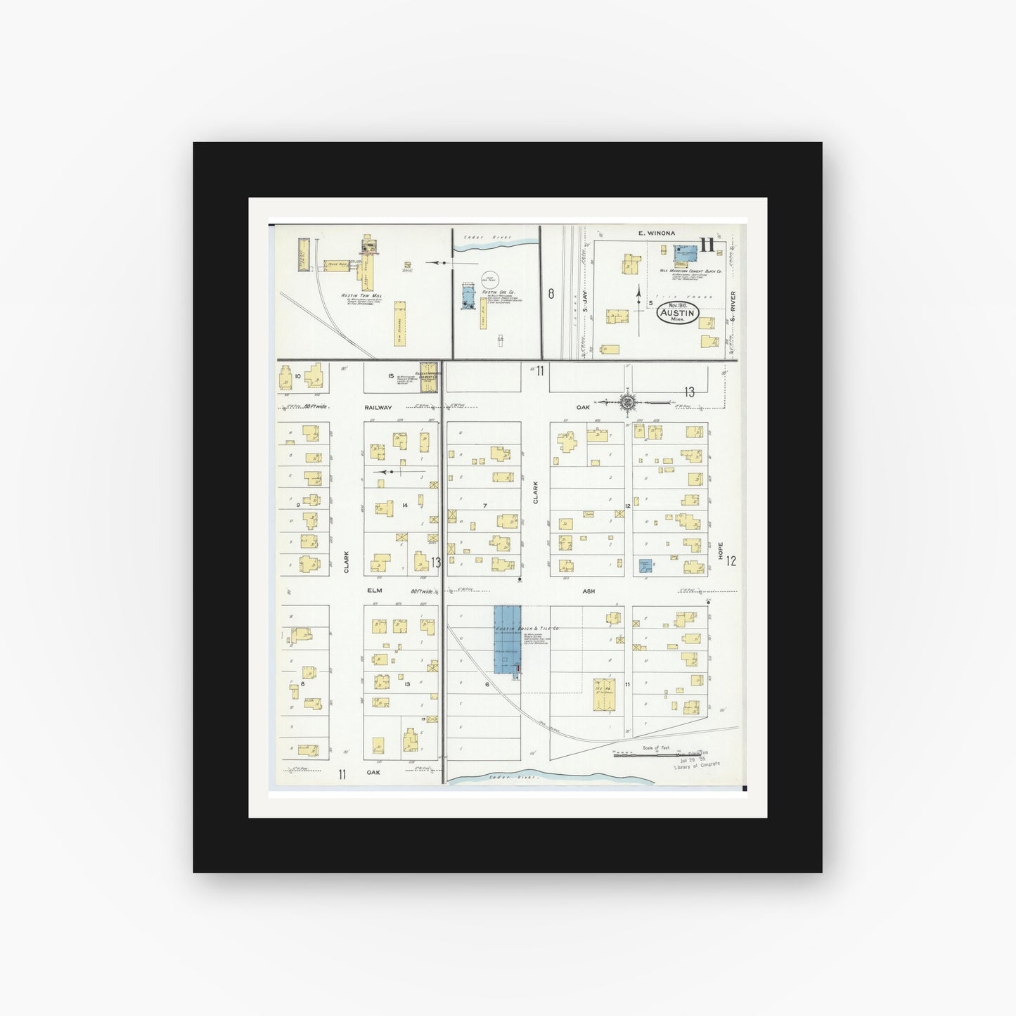 Old map wall art mockup — black gallery frame with white mat — Sanborn Fire Insurance Map from Austin, Mower County, Minnesota (1910), Sheet #0011