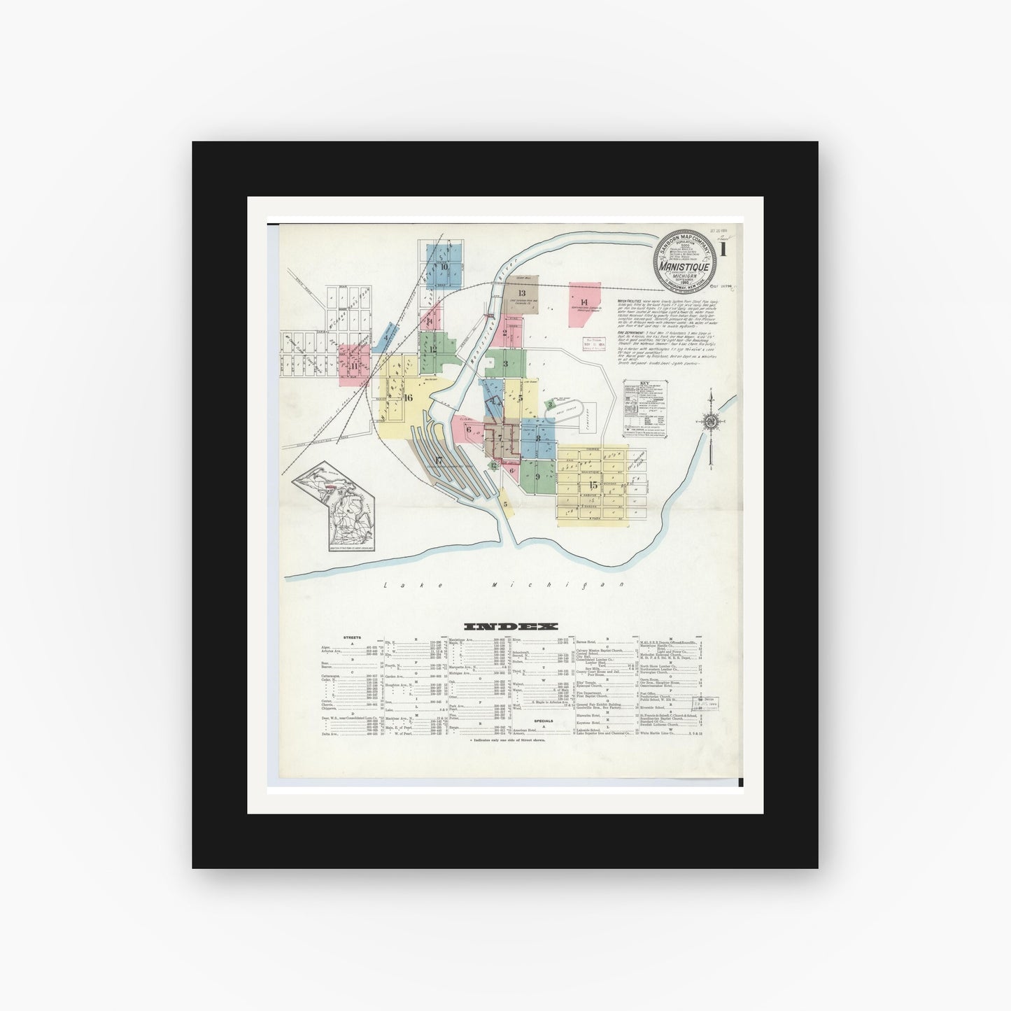 Old map wall art mockup — black gallery frame with white mat — Sanborn Fire Insurance Map from Manistique, Schoolcraft County, Michigan (1914) - Complete Map Set