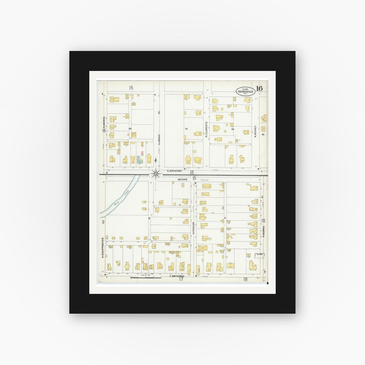 Old map wall art mockup — black gallery frame with white mat — Sanborn Fire Insurance Map from Gainesville, Cooke County, Texas (1902), Sheet #0016