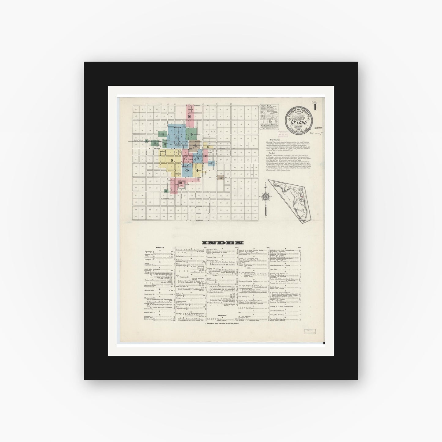Old map wall art mockup — black gallery frame with white mat — Sanborn Fire Insurance Map from De Land, Volusia County, Florida (1915) - Complete Map Set