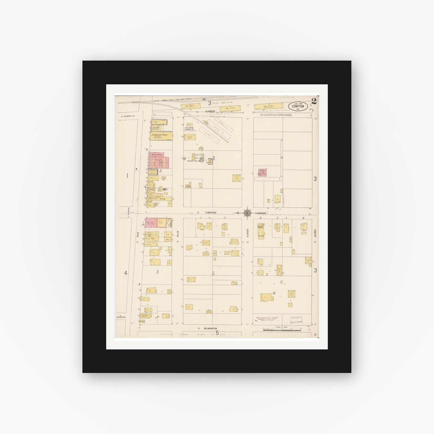 Old map wall art mockup — black gallery frame with white mat — Sanborn Fire Insurance Map from Compton, Los Angeles County, California (1916), Sheet #0002