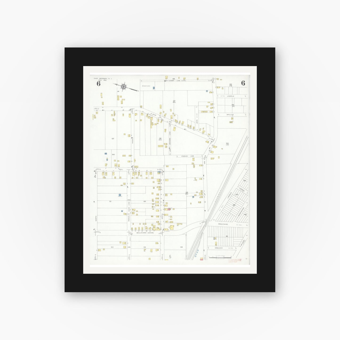 Old map wall art mockup — black gallery frame with white mat — Sanborn Fire Insurance Map from East Paterson, Bergen County, New Jersey (1932), Sheet #0006