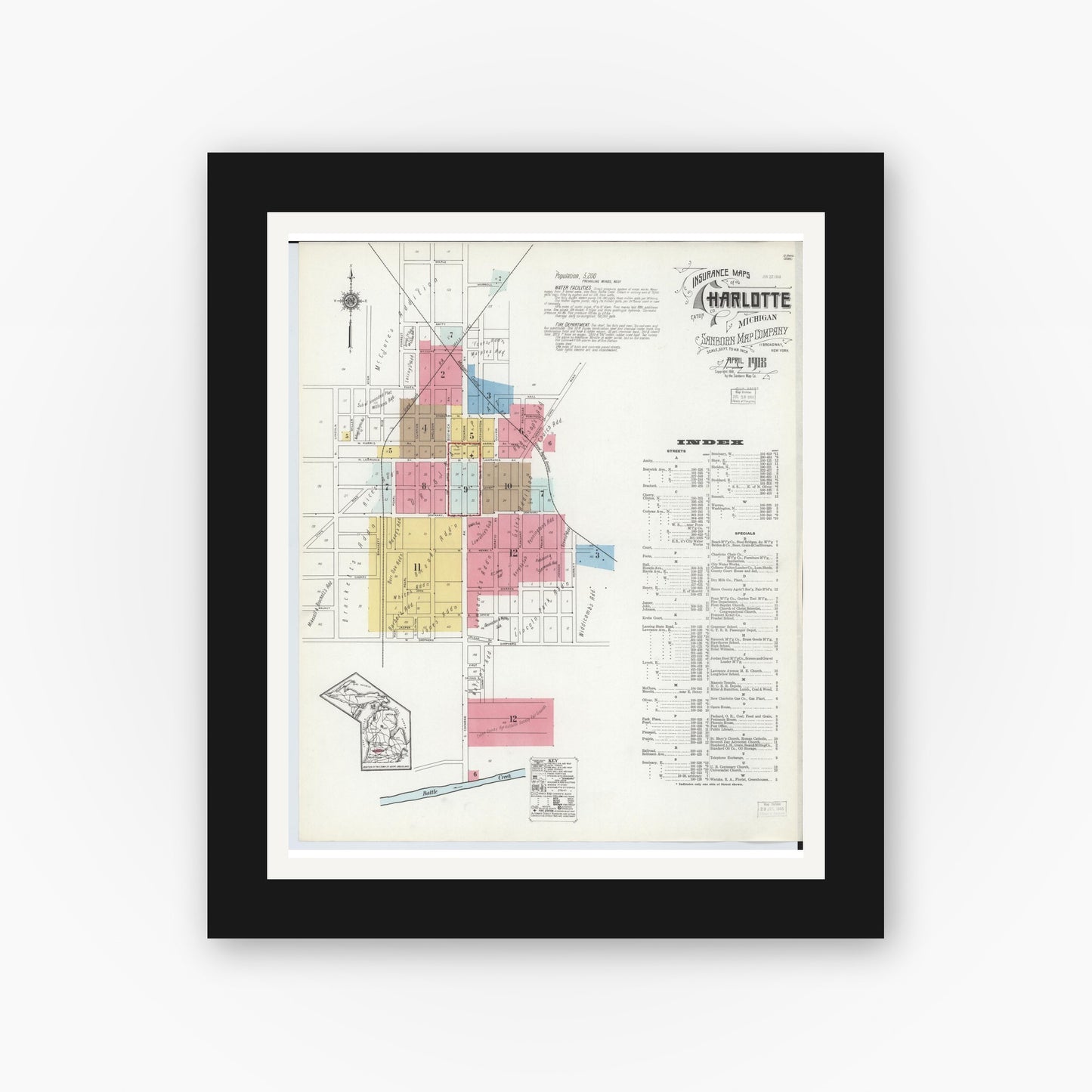 Old map wall art mockup — black gallery frame with white mat — Sanborn Fire Insurance Map from Charlotte, Eaton County, Michigan (1918), Sheet #0001