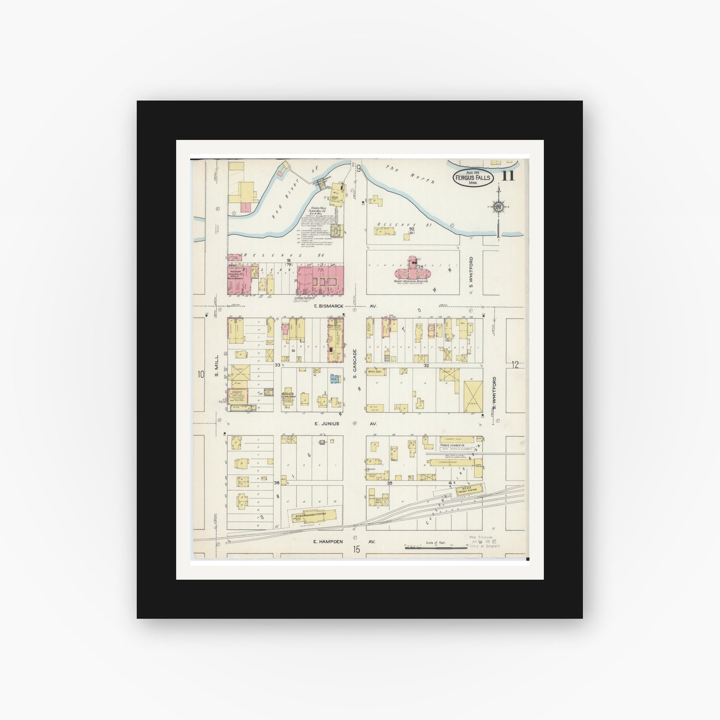 Old map wall art mockup — black gallery frame with white mat — Sanborn Fire Insurance Map from Fergus Falls, Otter Tail County, Minnesota (1915), Sheet #0011
