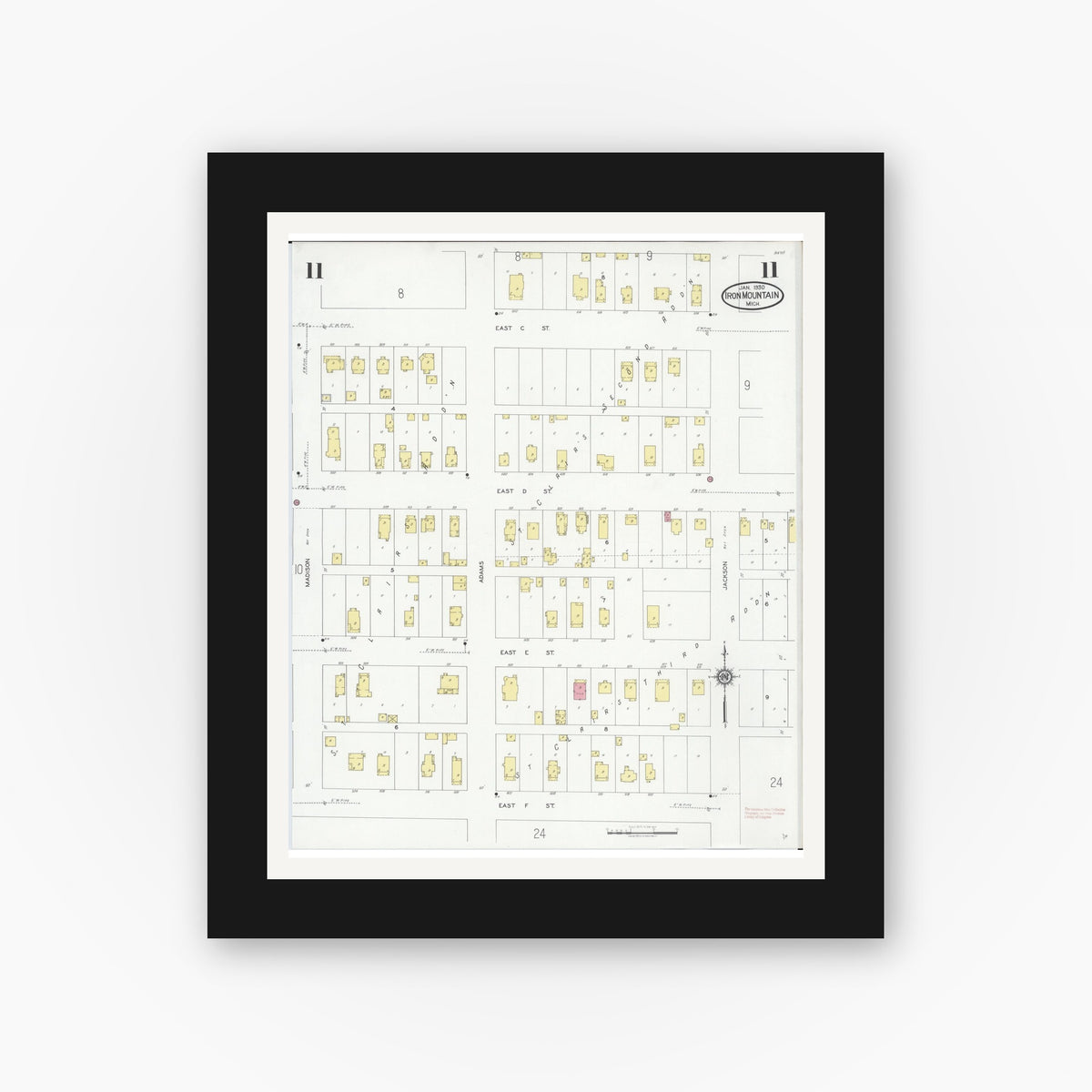 Old map wall art mockup — black gallery frame with white mat — Sanborn Fire Insurance Map from Iron Mountain, Dickinson County, Michigan (1930), Sheet #0011