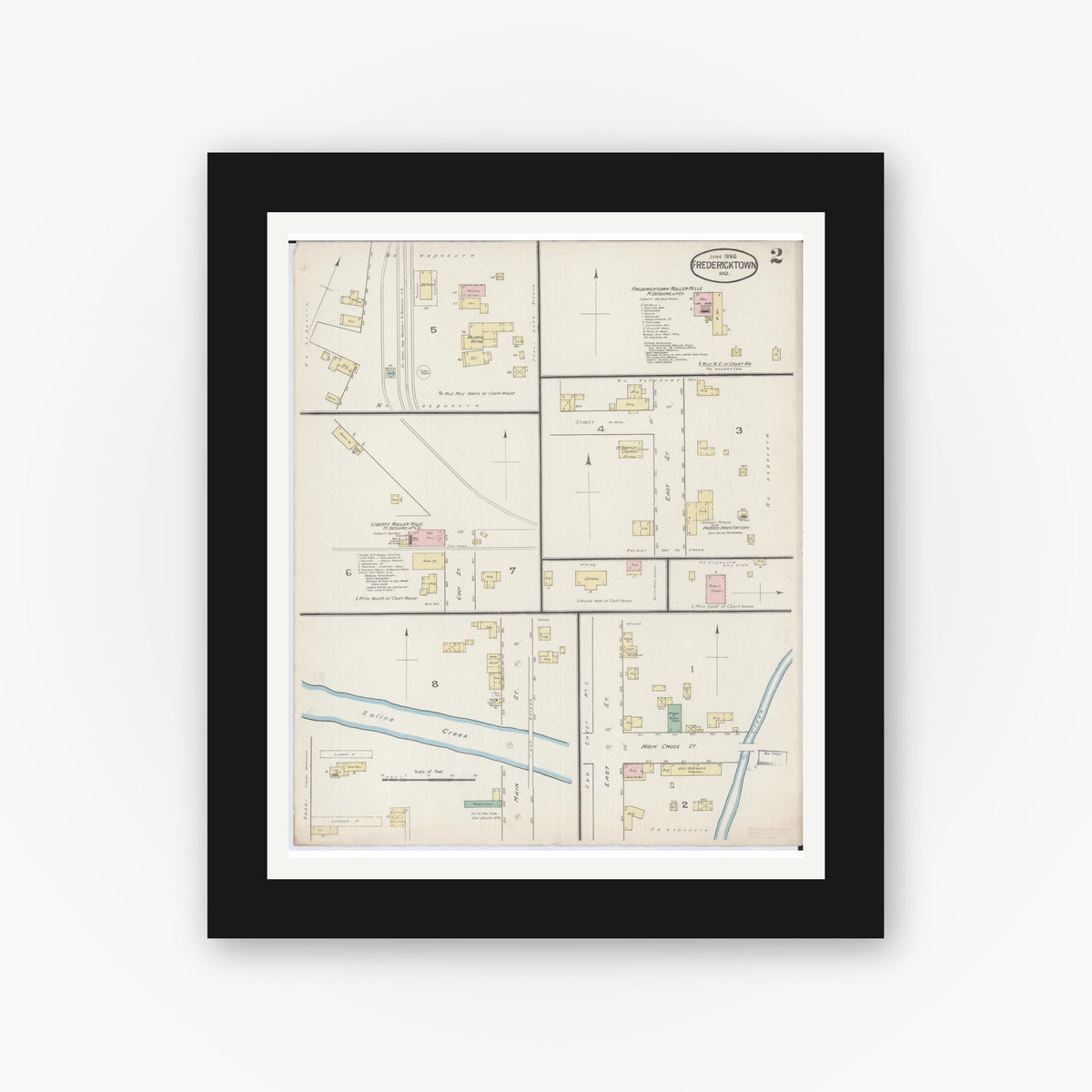 Old map wall art mockup — black gallery frame with white mat — Sanborn Fire Insurance Map from Fredericktown, Madison County, Missouri (1886), Sheet #0002