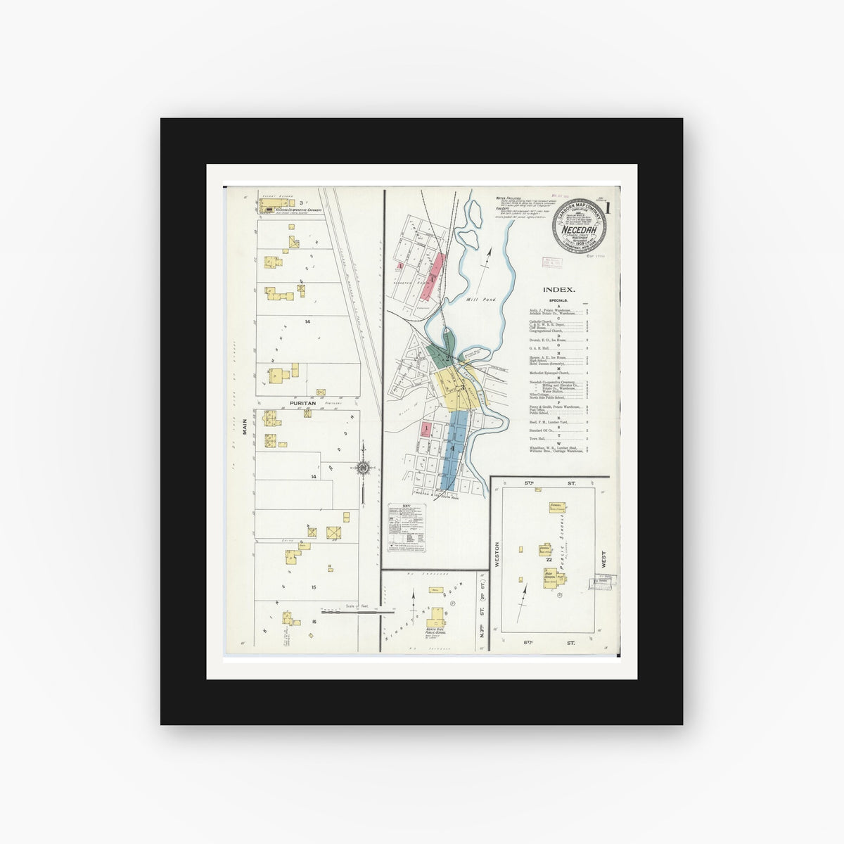 Old map wall art mockup — black gallery frame with white mat — Sanborn Fire Insurance Map from Necedah, Juneau County, Wisconsin (1909), Sheet #0001