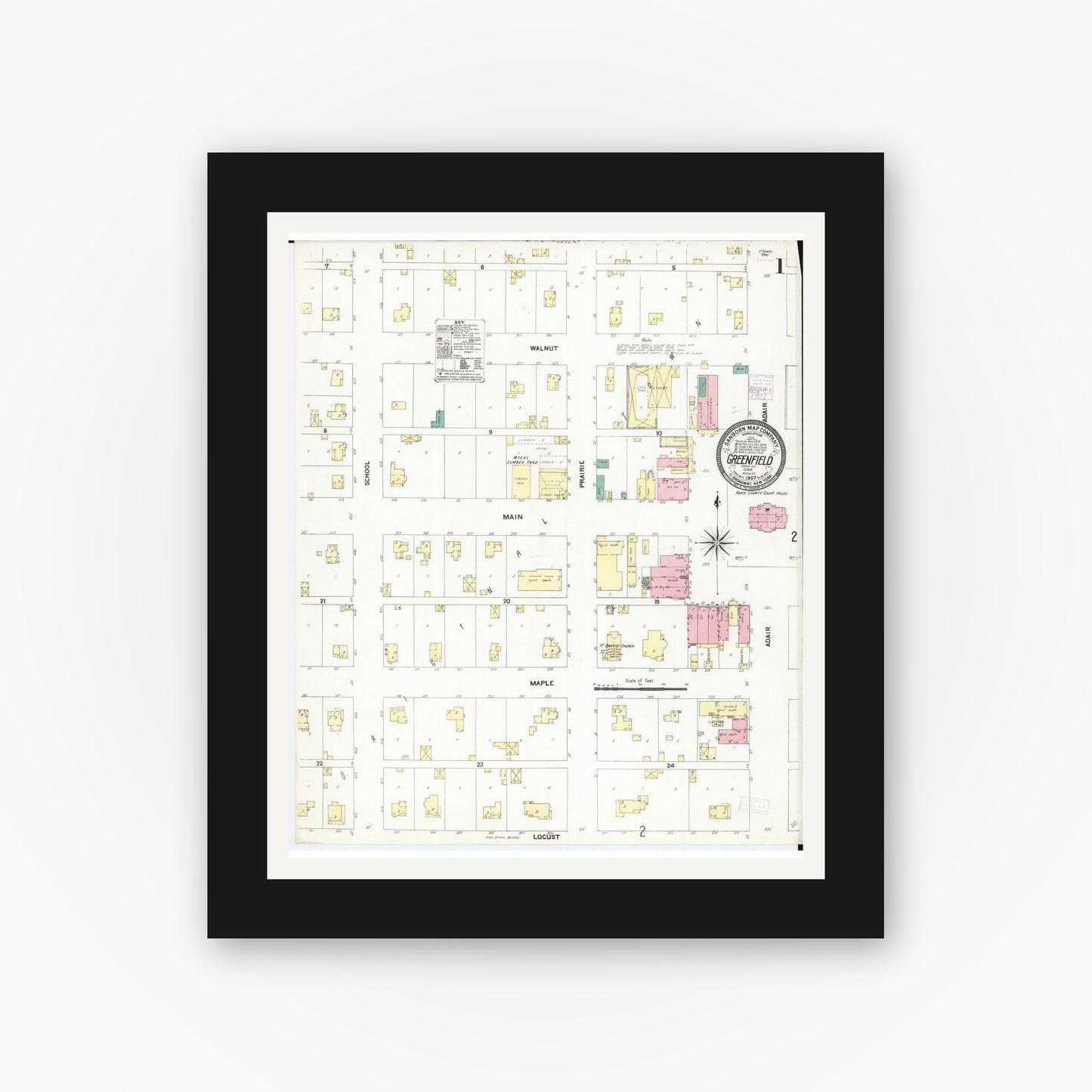 Old map wall art mockup — black gallery frame with white mat — Sanborn Fire Insurance Map from Greenfield, Adair County, Iowa (1907) — Complete Set