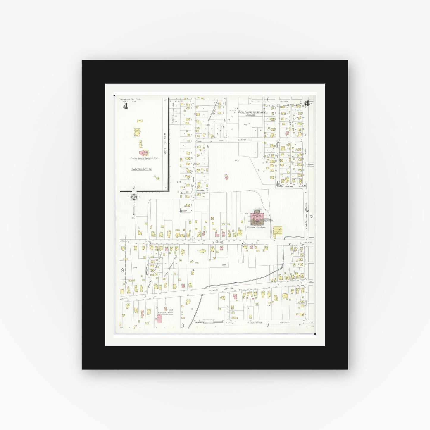 Old map wall art mockup — black gallery frame with white mat — Sanborn Fire Insurance Map from Wilmington, Clinton County, Ohio (1933), Sheet #0004
