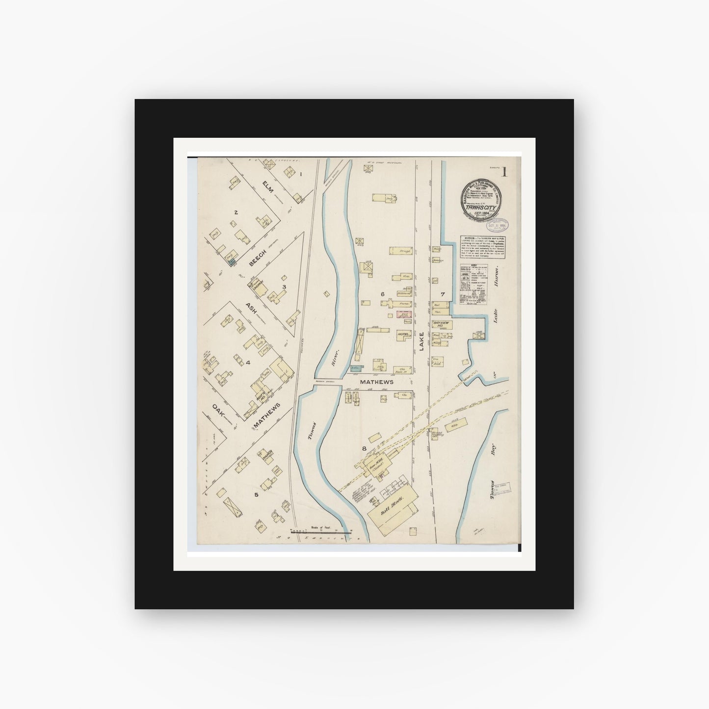 Old map wall art mockup — black gallery frame with white mat — Sanborn Fire Insurance Map from Tawas City, Iosco County, Michigan (1884) - Complete Map Set