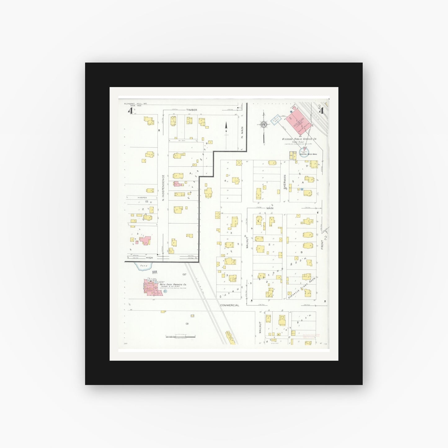 Old map wall art mockup — black gallery frame with white mat — Sanborn Fire Insurance Map from Pleasant Hill, Cass County, Missouri (1932), Sheet #0004