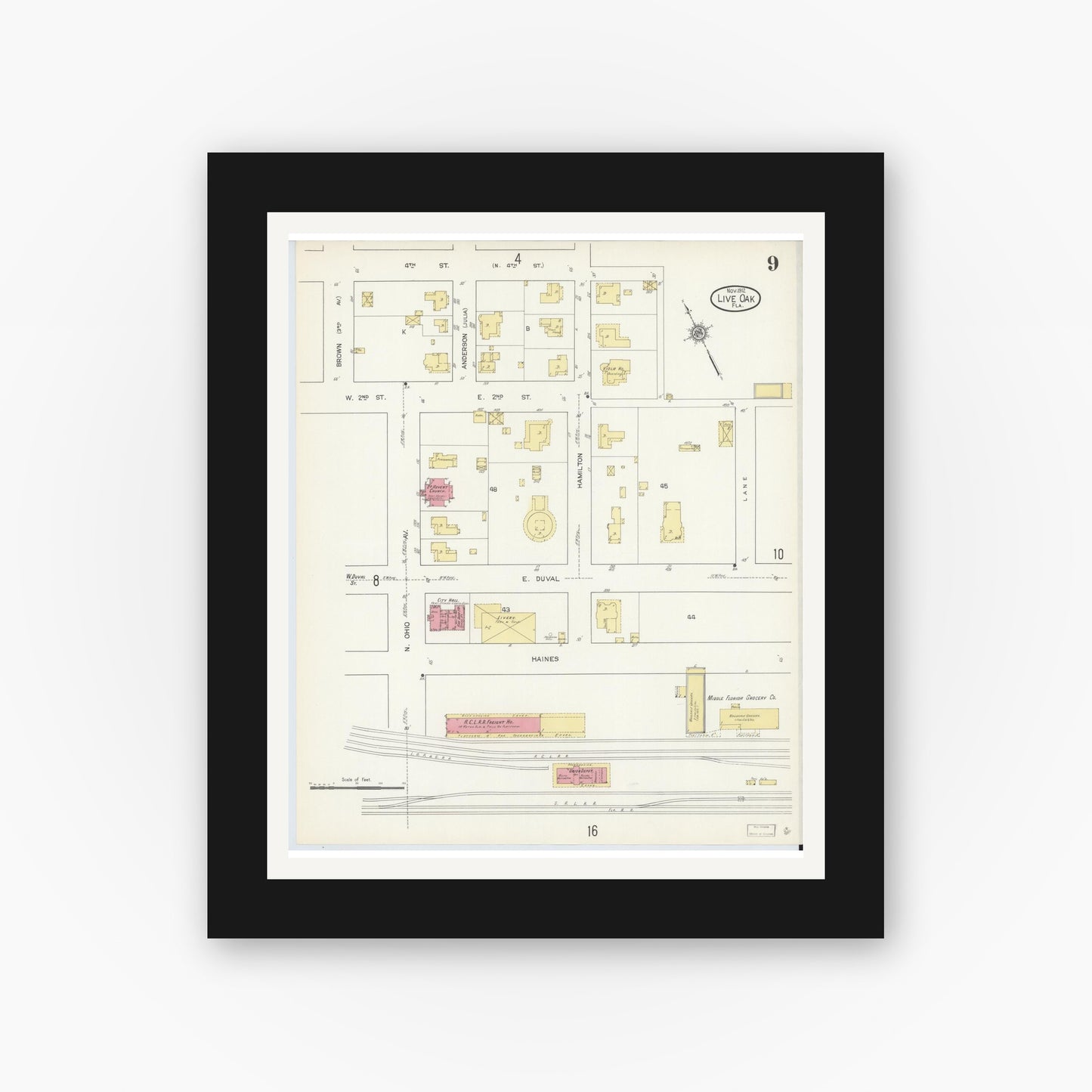 Old map wall art mockup — black gallery frame with white mat — Sanborn Fire Insurance Map from Live Oak, Suwanee County, Florida (1912), Sheet #0009