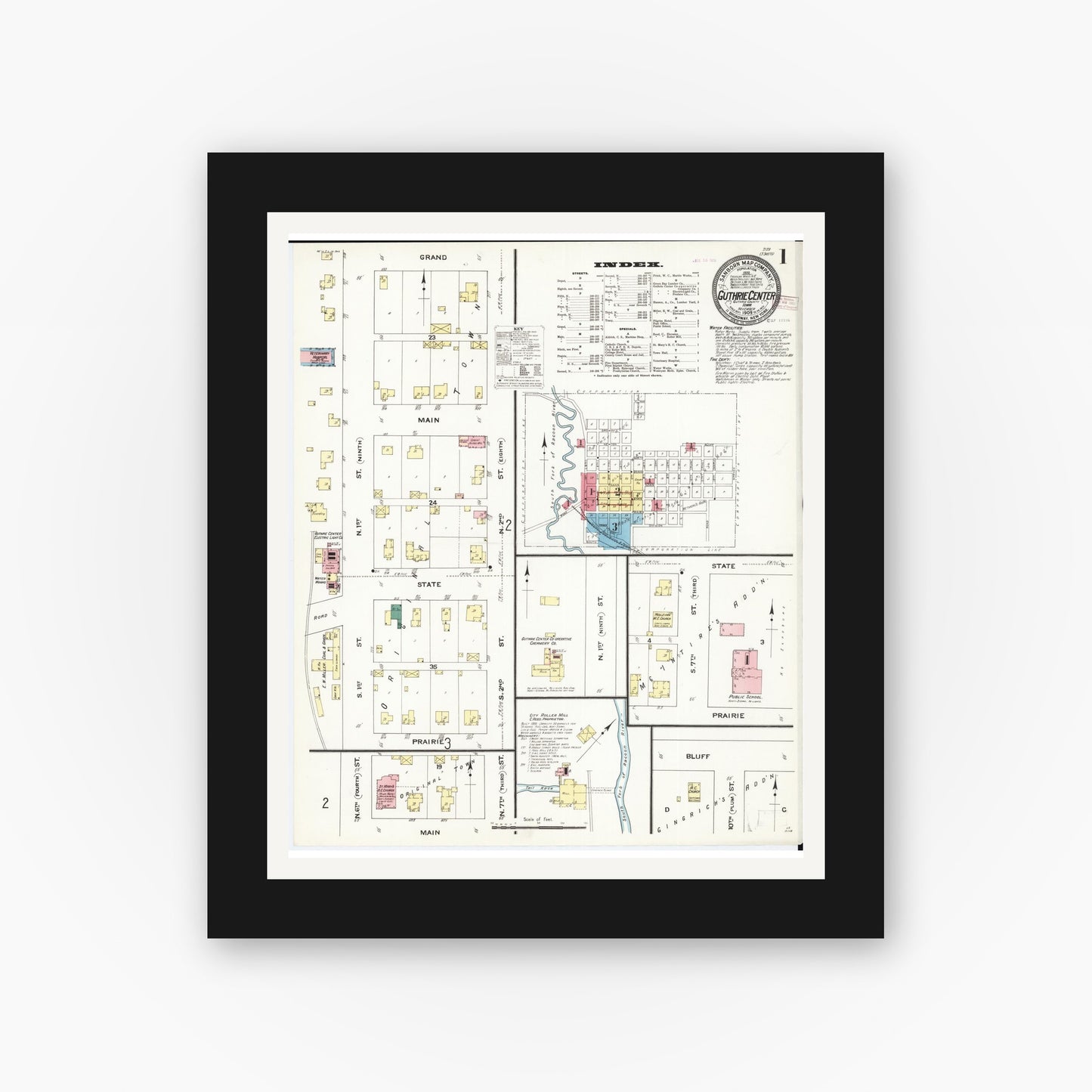 Old map wall art mockup — black gallery frame with white mat — Sanborn Fire Insurance Map from Guthrie Center, Guthrie County, Iowa (1909) — Complete Set
